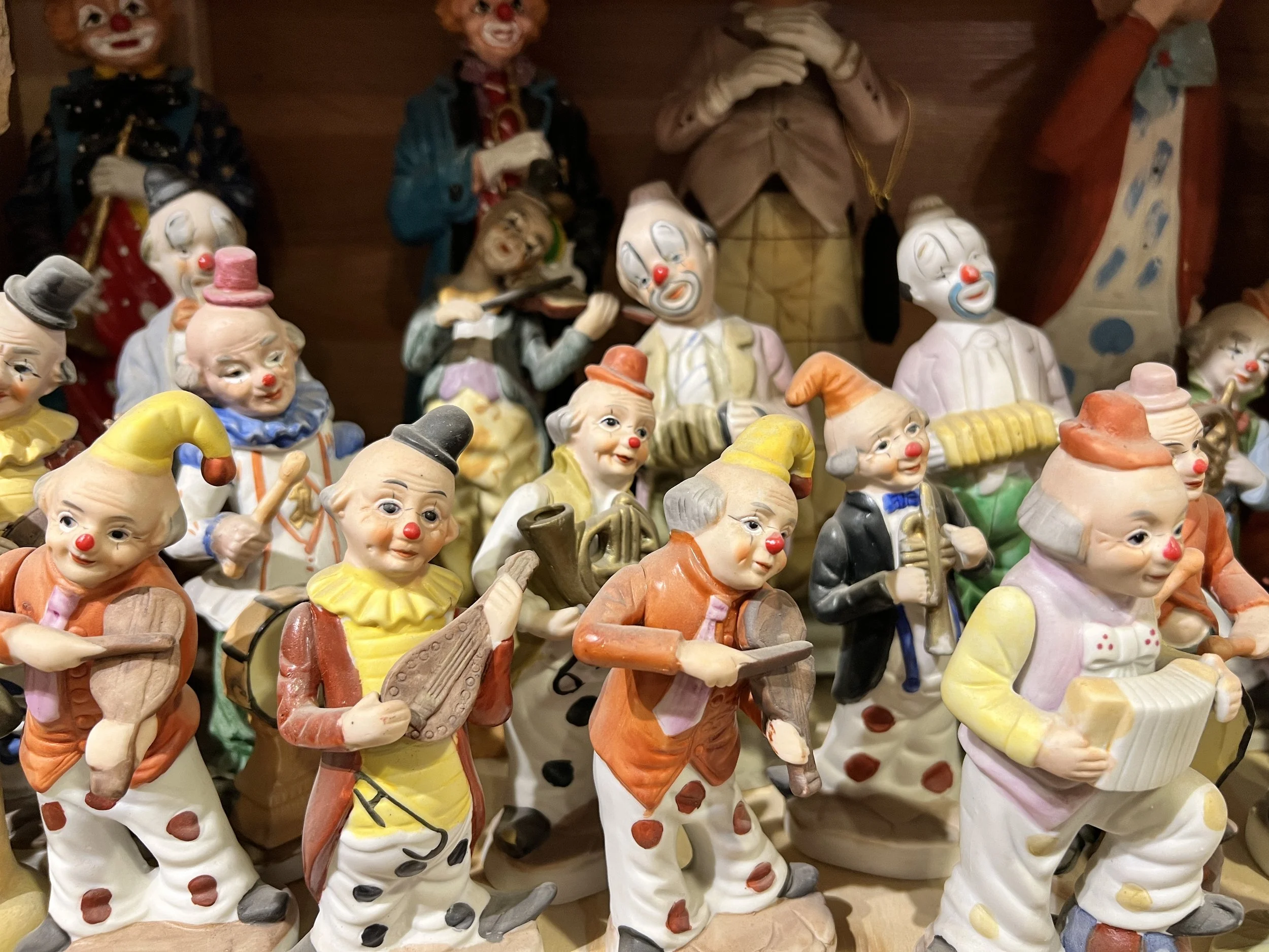 Haunted clown figurines.