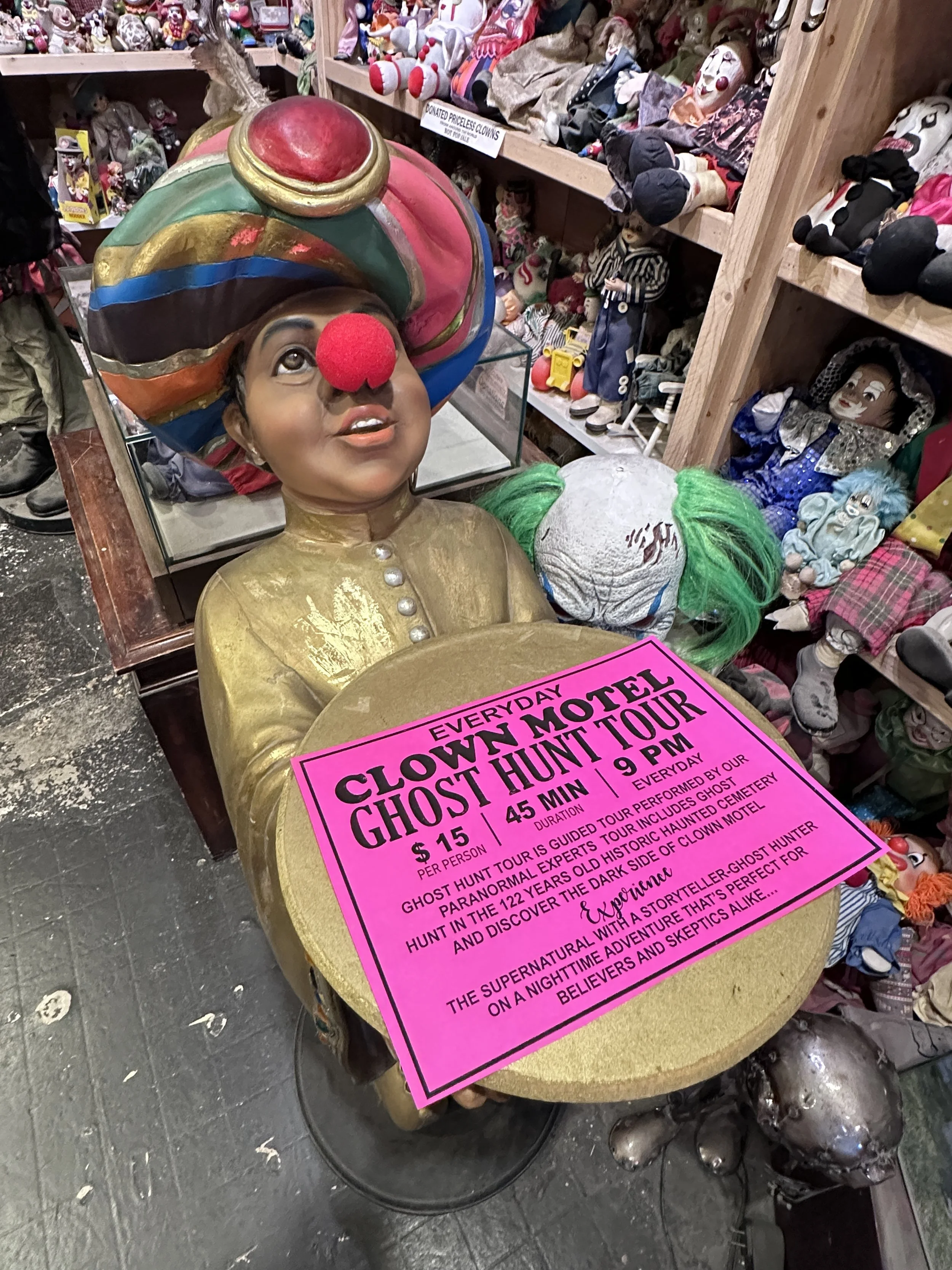 Fortune telling clown promoting ghost tours.