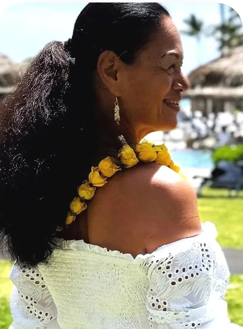 Kumu Leialoha a native Hawaiian teaching Hawaiian cultural dance and mele (singing) at ManaFest, a transformational music, dance, arts, and culture festival in Hawaii 