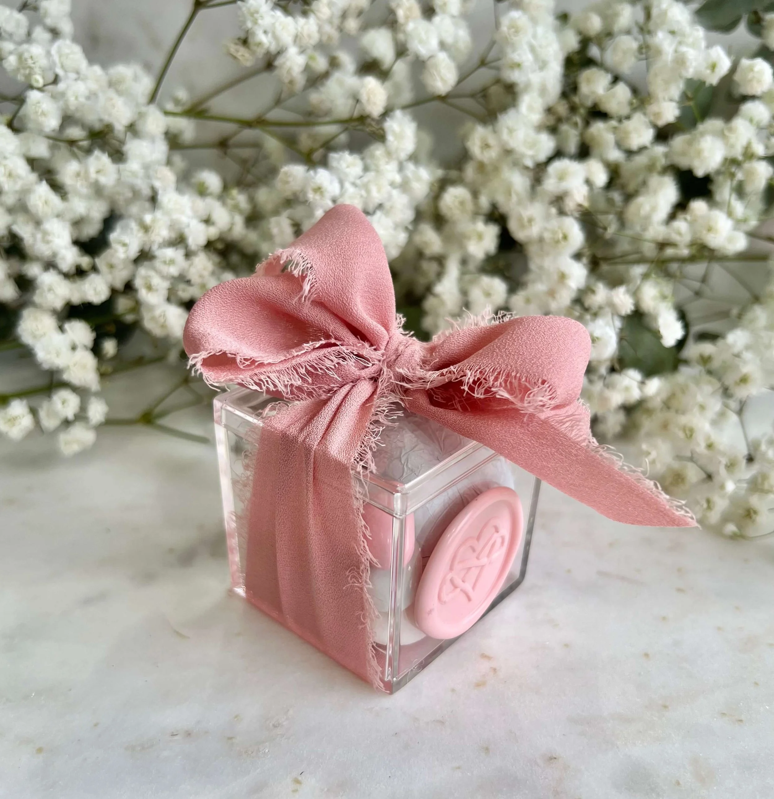 Clear chocolate box wedding favour filled with premium chocolates Brisbane