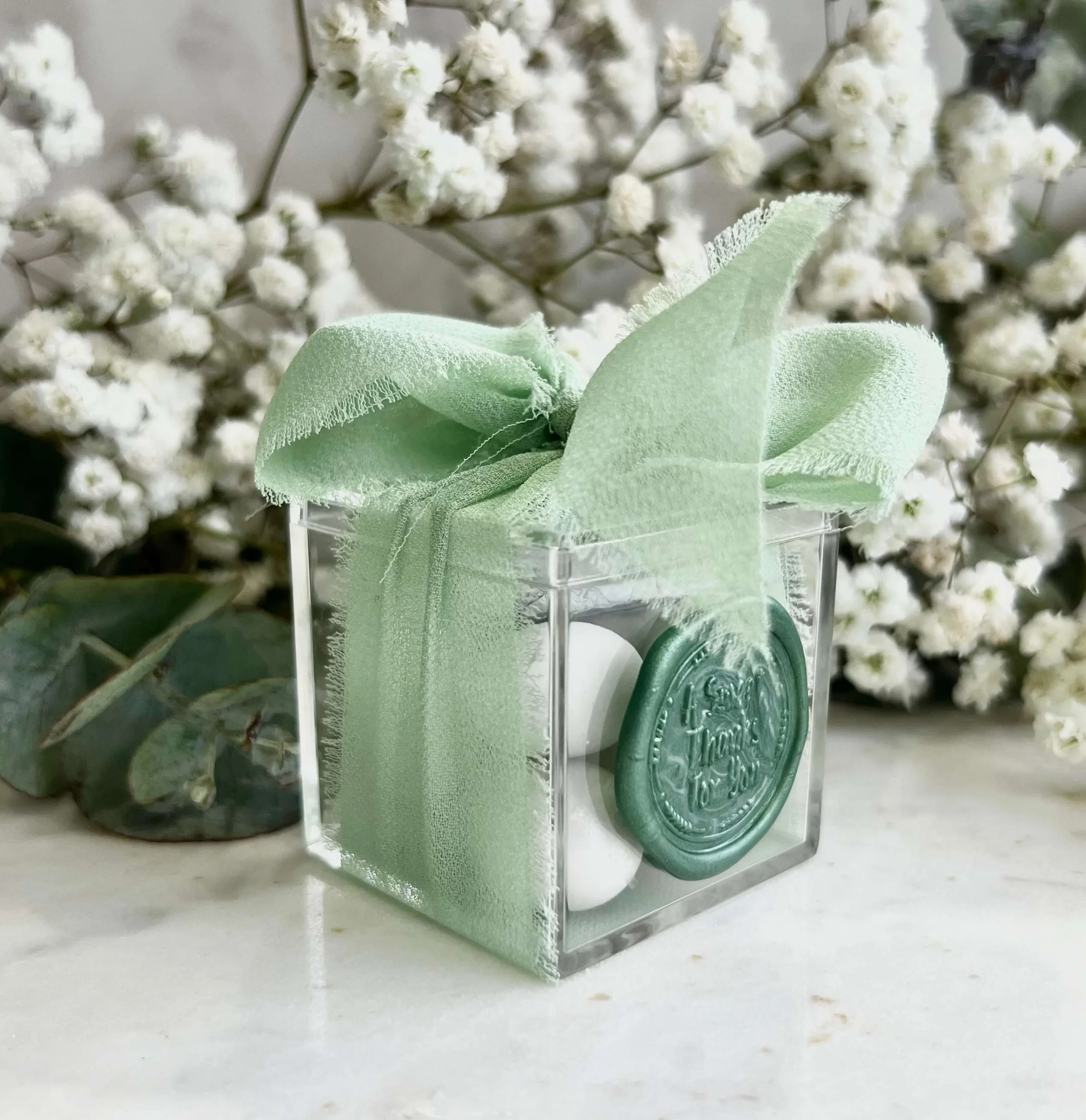Clear chocolate box wedding favour filled with premium chocolates Brisbane