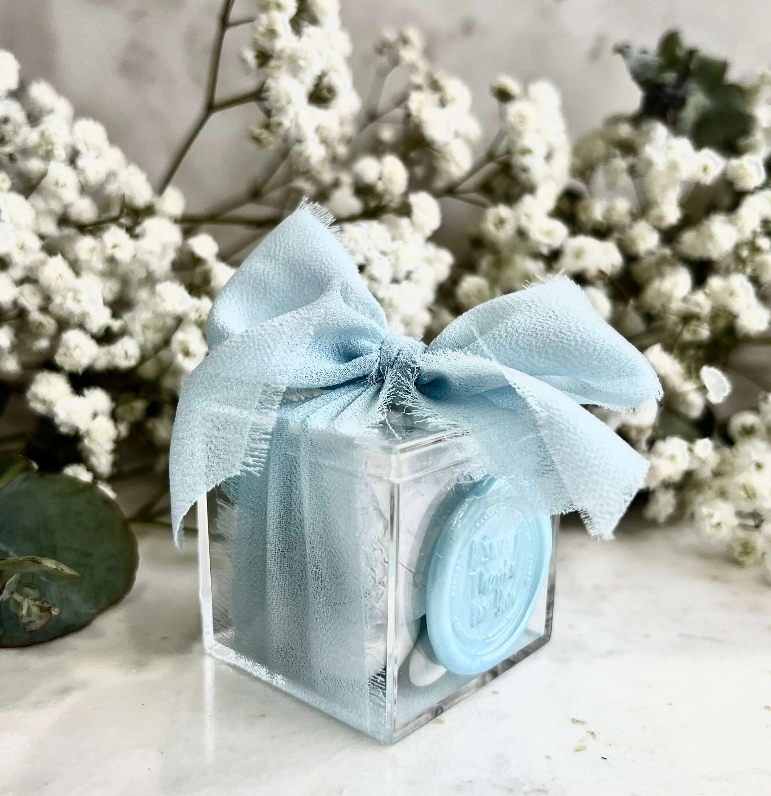 Clear chocolate box wedding favour filled with premium chocolates Brisbane