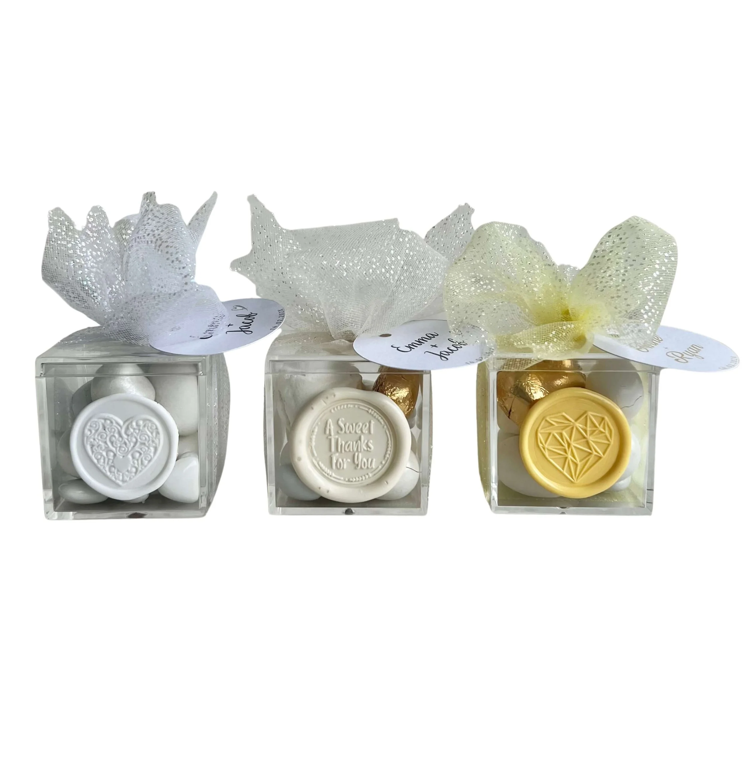 Clear acrylic cube box with sparkle tulle and gourmet chocolates elegant bonbonniere
