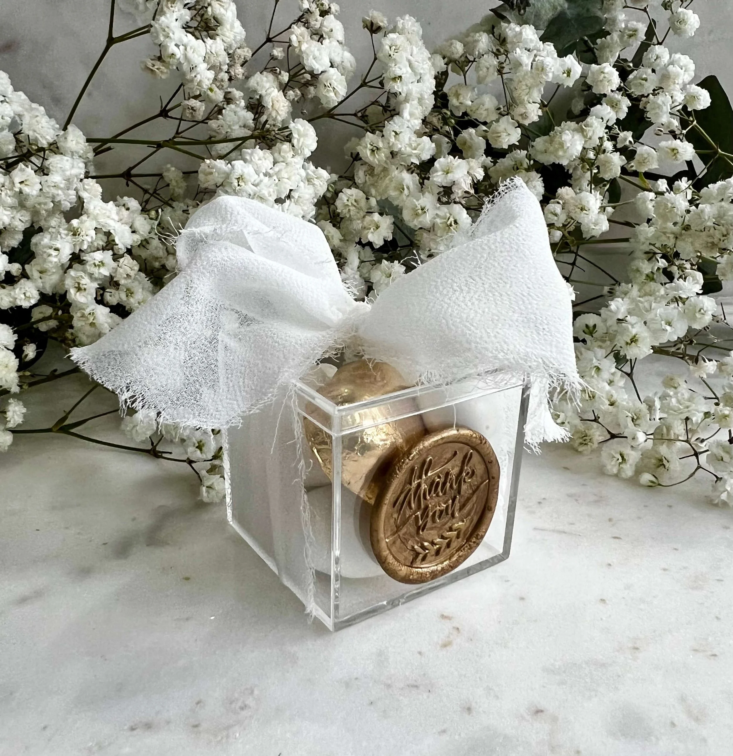 Clear chocolate box wedding favour filled with premium chocolates Brisbane