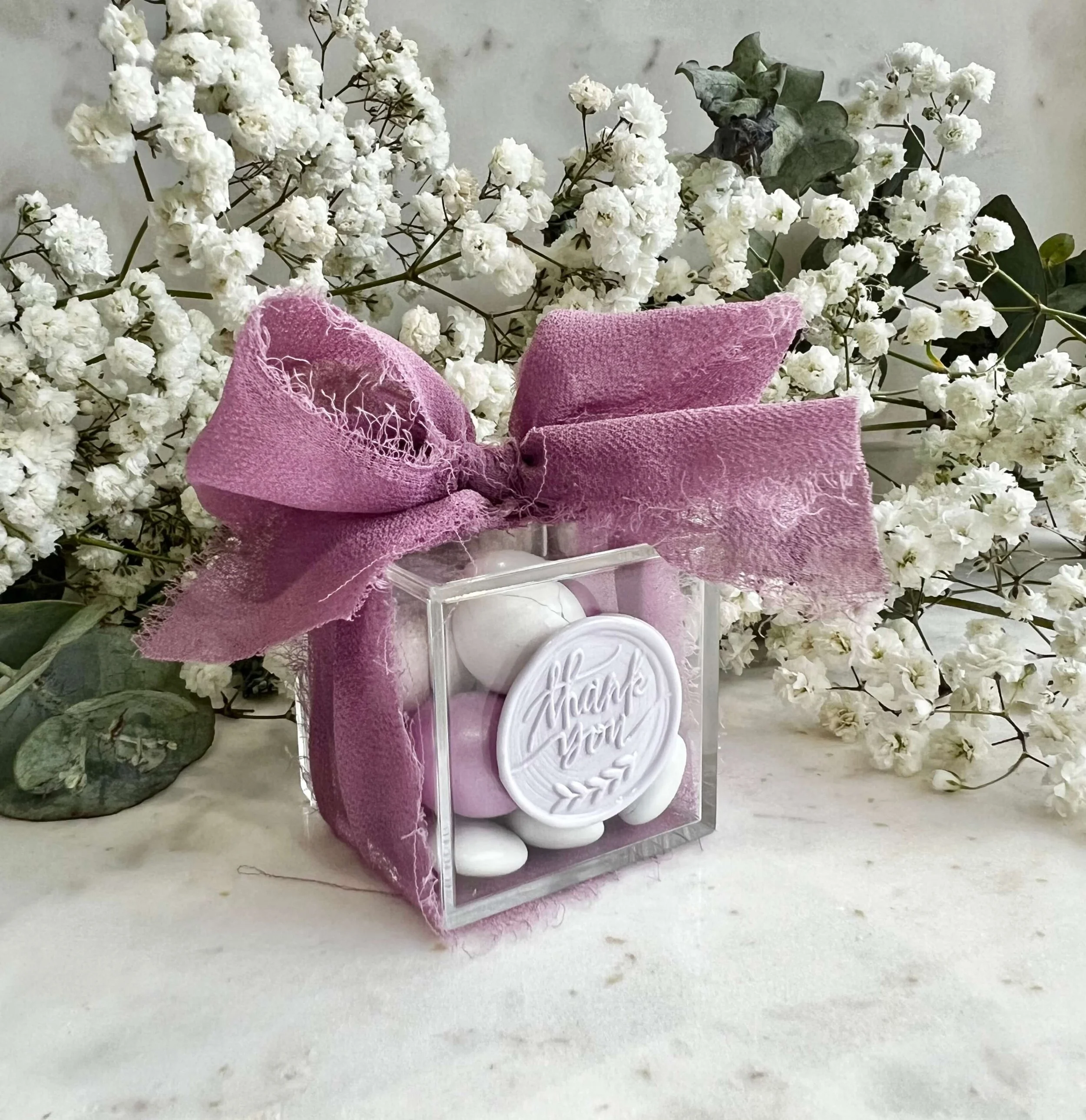 Clear chocolate box wedding favour filled with premium chocolates Brisbane
