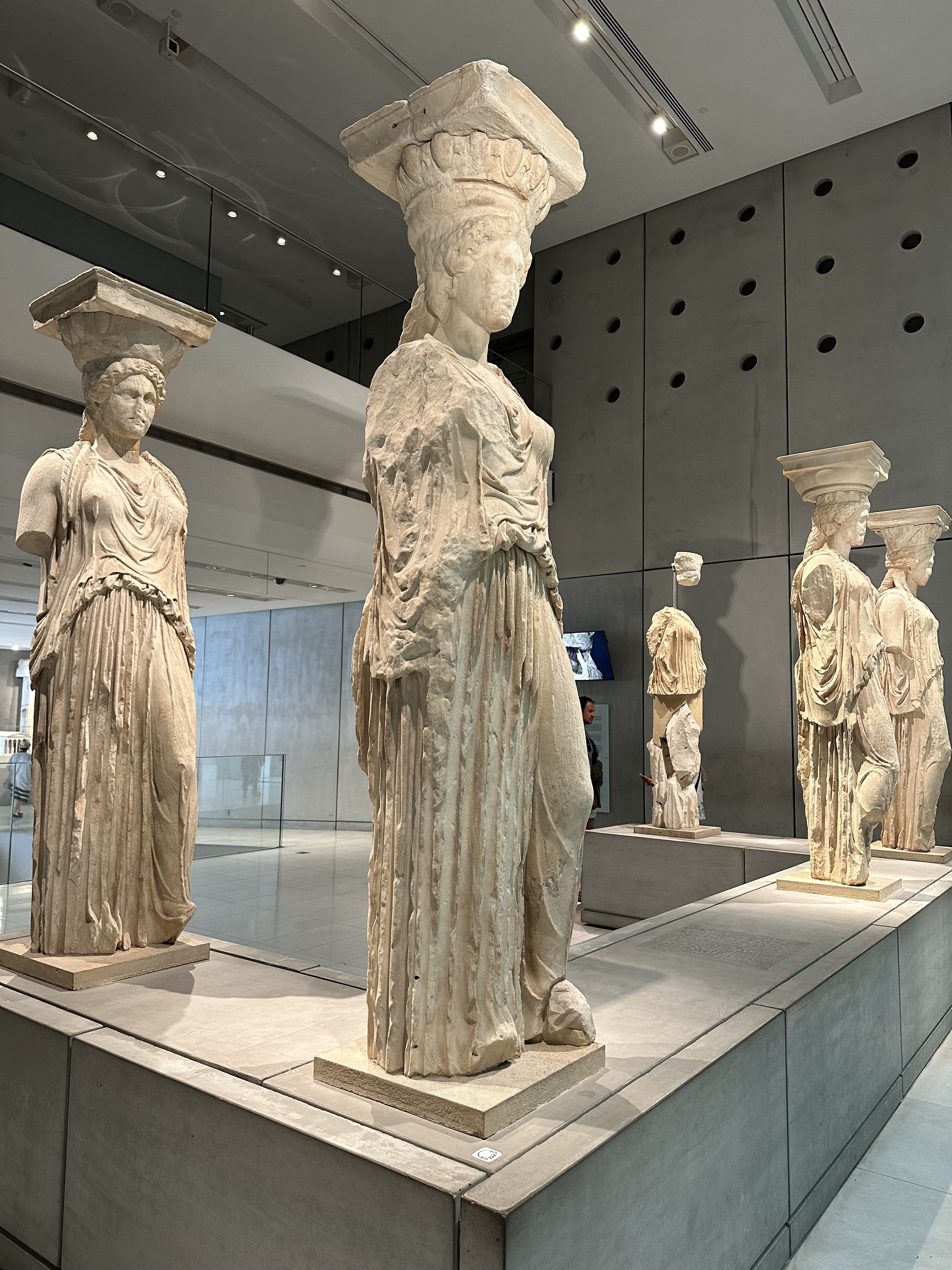 statues at acropolis museum