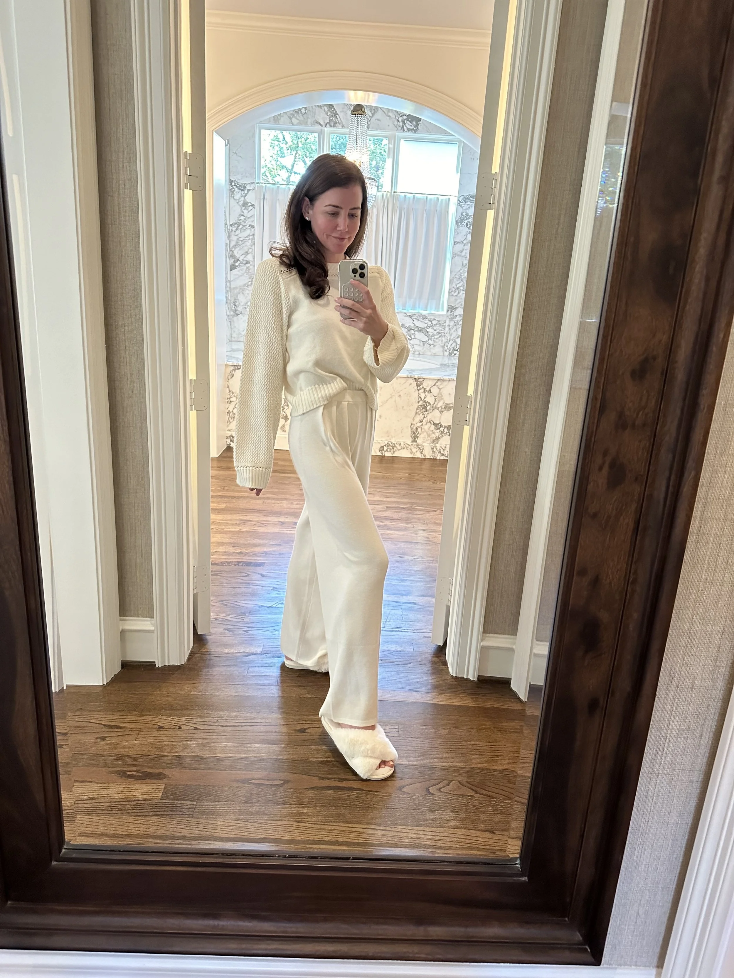 amy havins wearing fuzzy slippers at her home