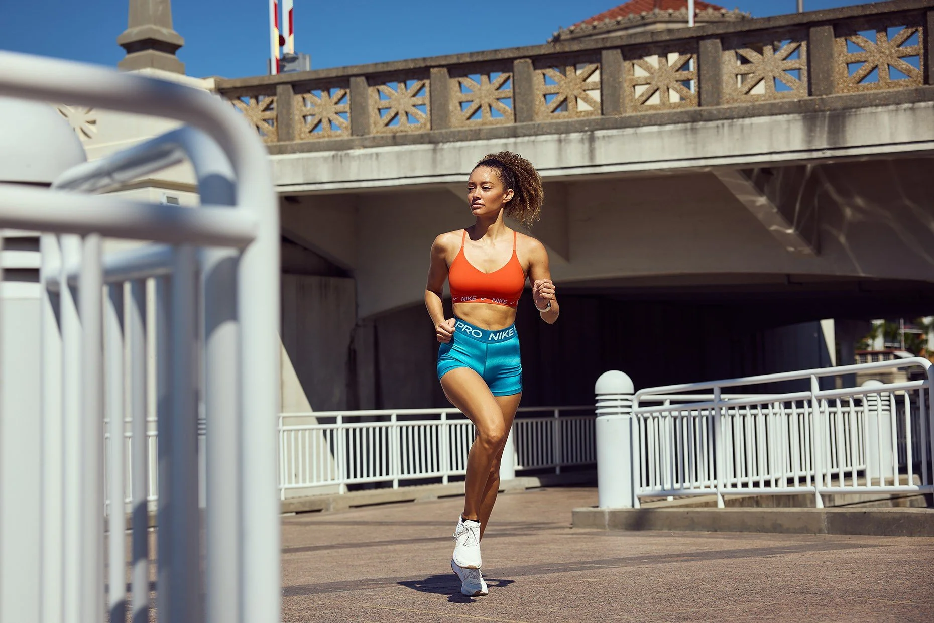 James-Acomb-photographer-woman-running-in-urban-setting.jpg