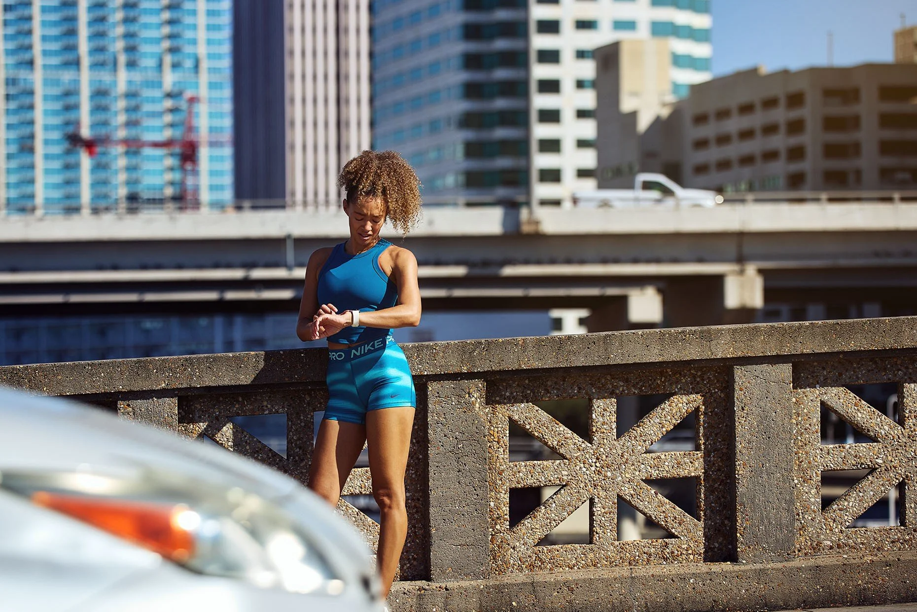 James-Acomb-photographer-woman-checking-fitness-tracker.jpg