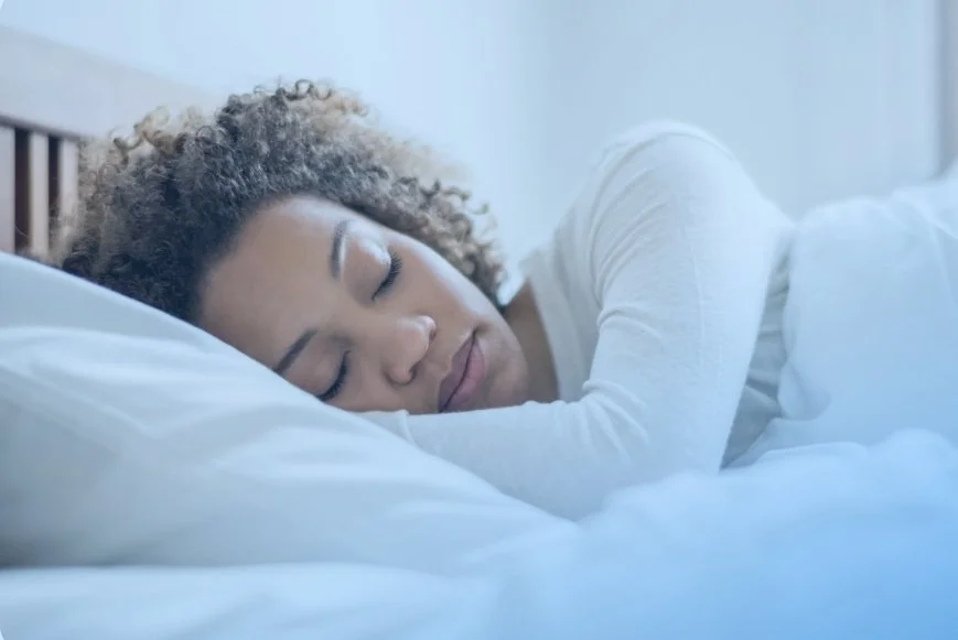 Woman sleeping representing sleep optimization for brain health. DexaFit Scan in Houston, TX