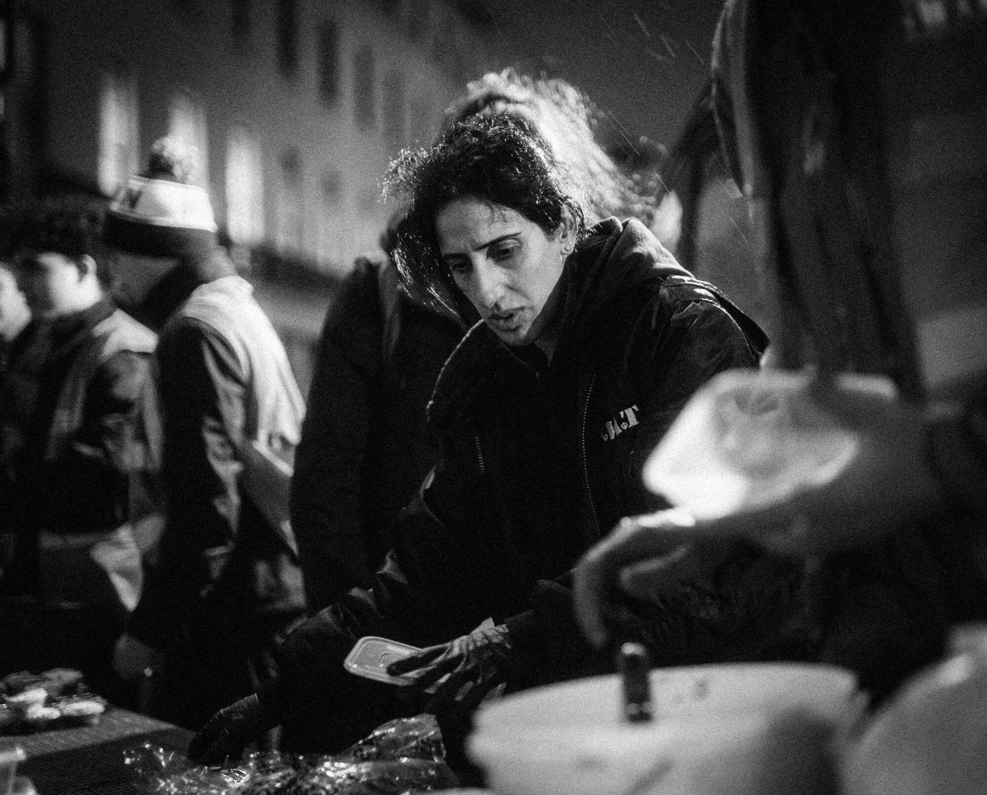 Final preparations by a NishkamSWAT volunteer before handing out food. . London, UK. © 2024 Matt Mahmood-Ogston