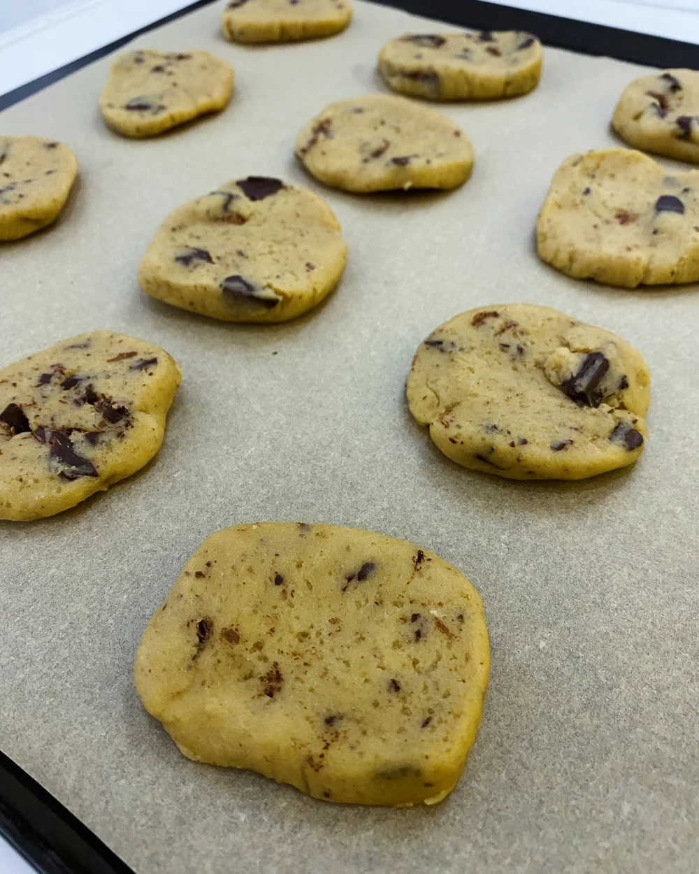 unbaked cookies on baking sheet
