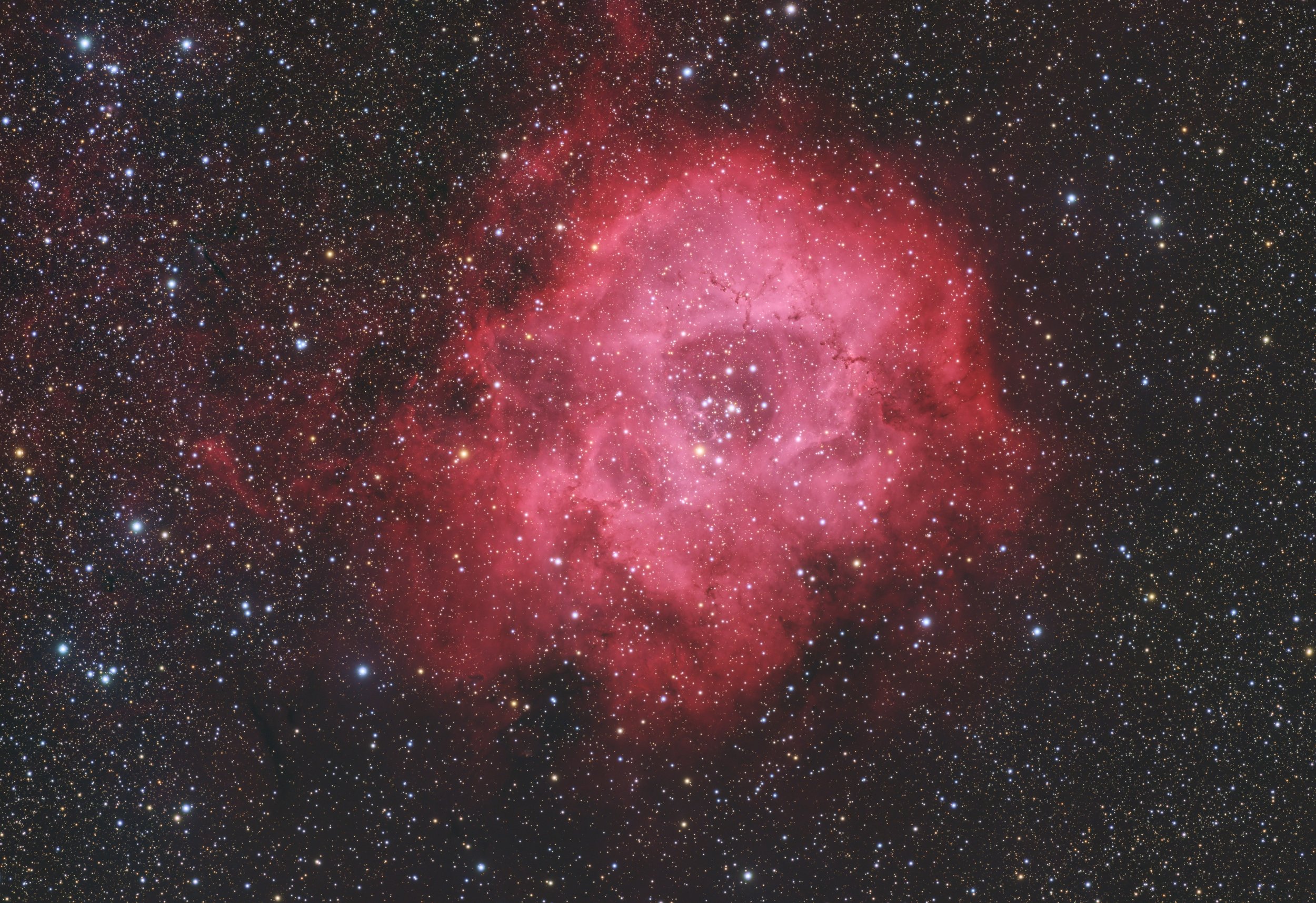 Rosette Nebula (Caldwell 49), and the open cluster in the center (NGC 2244) shot in broad band + narrow band filter (Halpha+[OIII]). Click the right arrow to see the broad band image without adding the narrowband data.