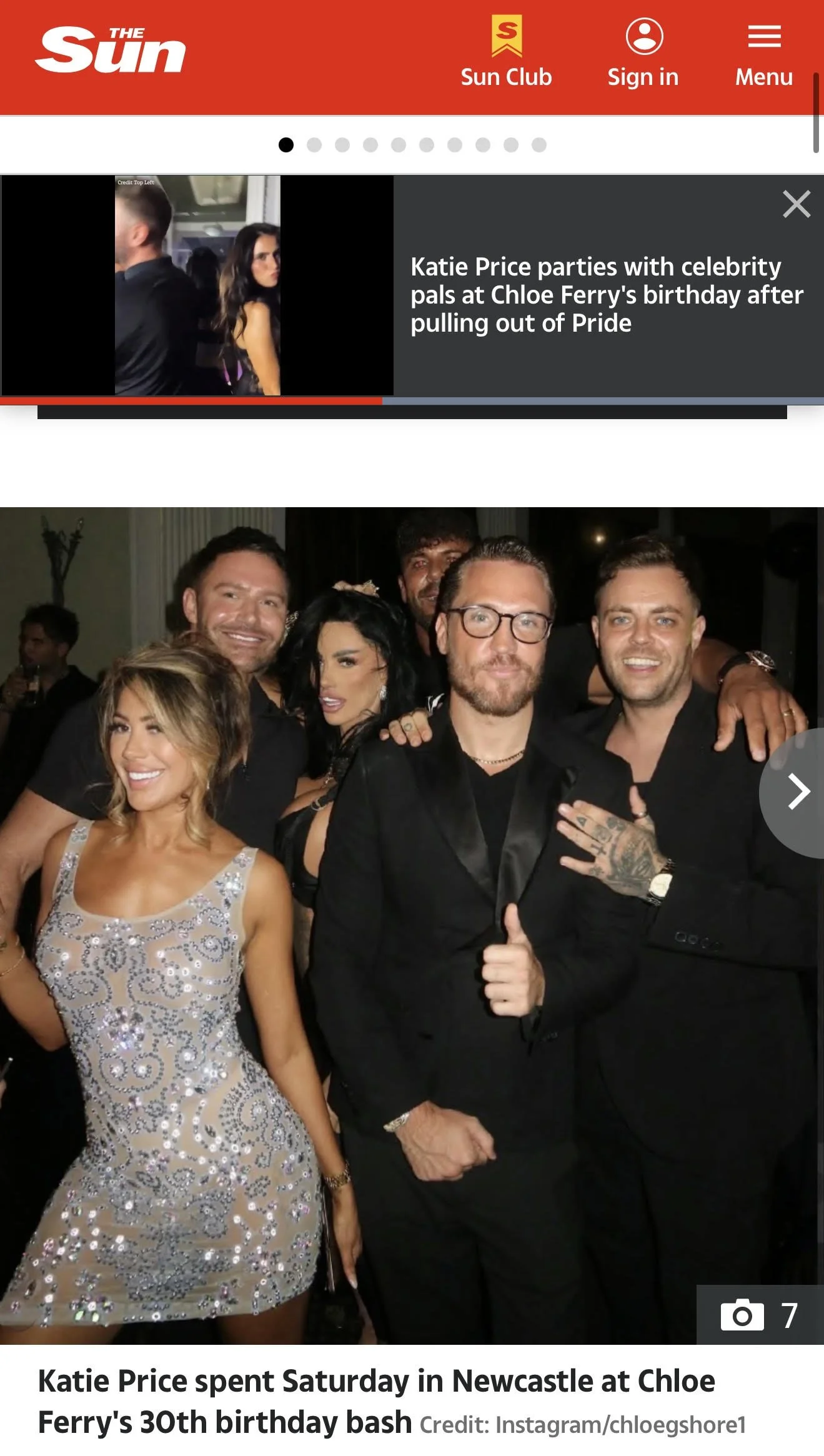 A group of people dressed in formal attire at a party, with some smiling and posing for the camera.