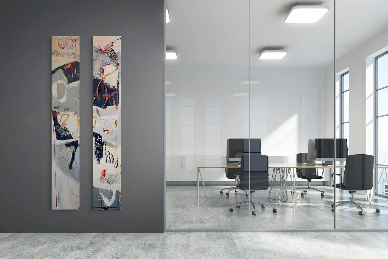 Grounded 1 & 2 - long narrow abstract painting hanging on an office wall