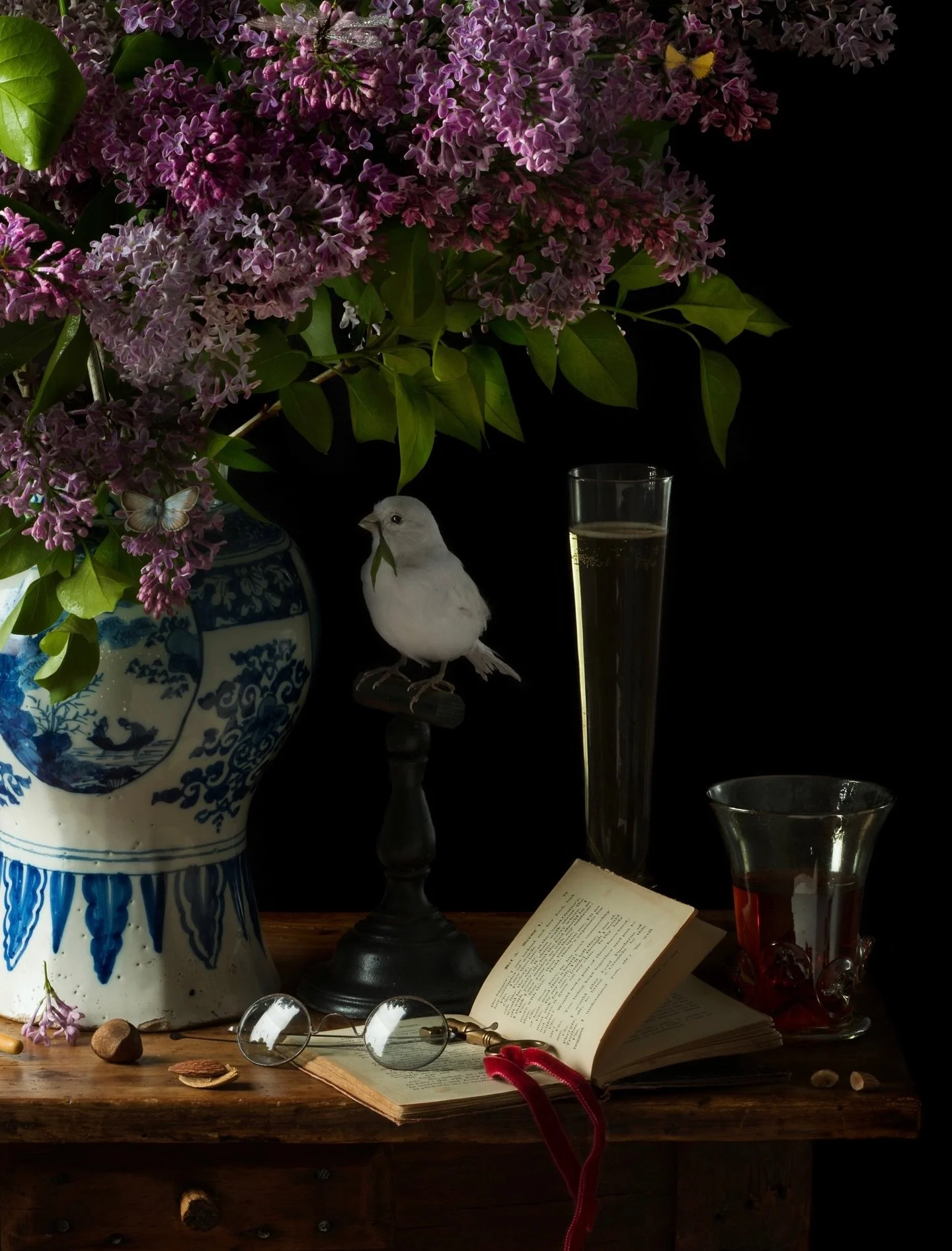 Detail of a new image from the Natura Morta portfolio. Garden Lilacs &amp; White Canary, 2025. The fragrant Lilacs are from our orchard and the White Canary I was gifted from the @guccibeauty campaign from couple of years ago. #thealchemistgarden #gu