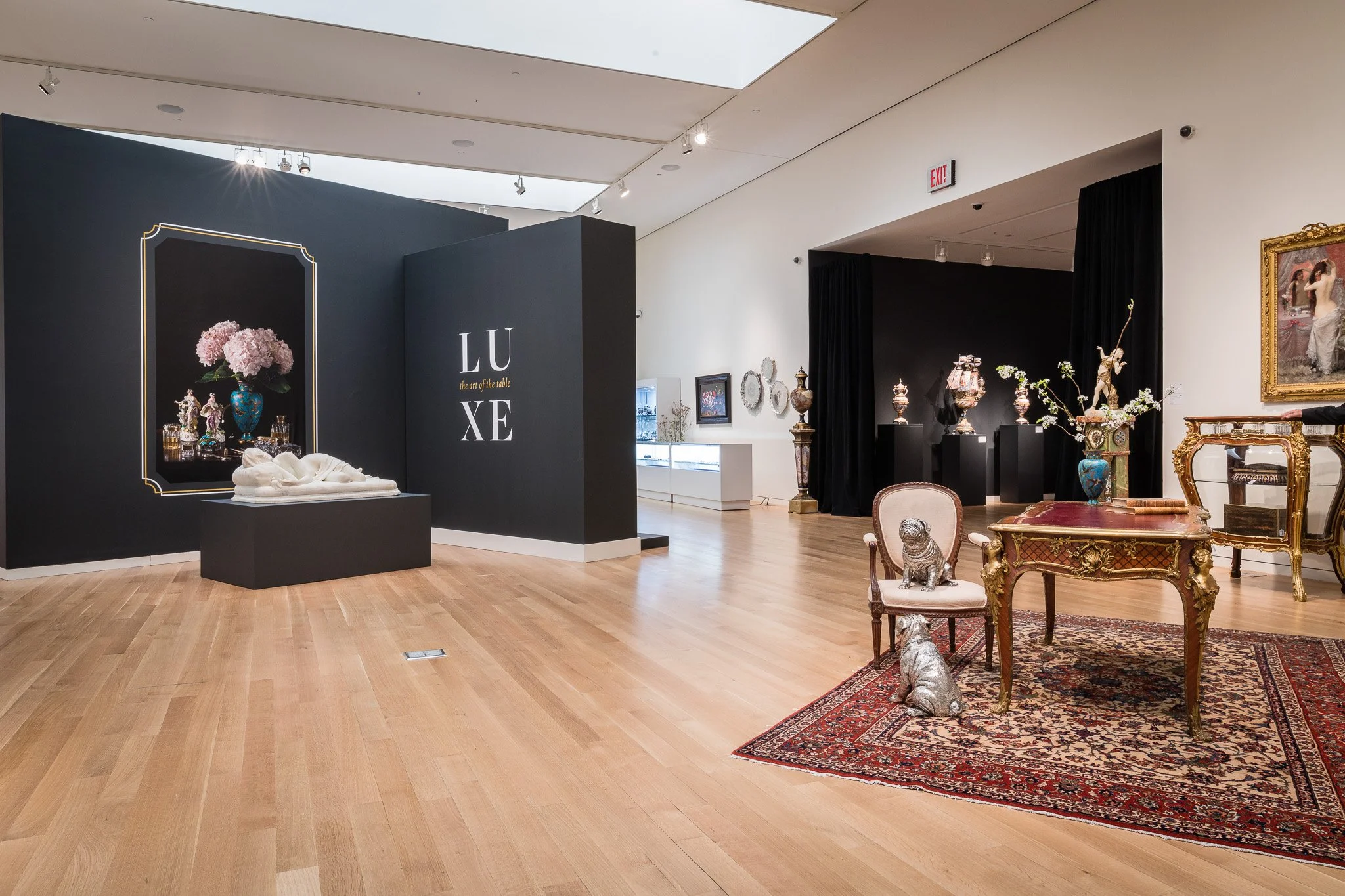 Paulette Tavormina for Sotheby’s — Still life from LUXE: The Art of the Table, featuring floral-accented sculptures, paintings, and antique furniture in her Old Master style, photographed in Sotheby’s 10th floor gallery.