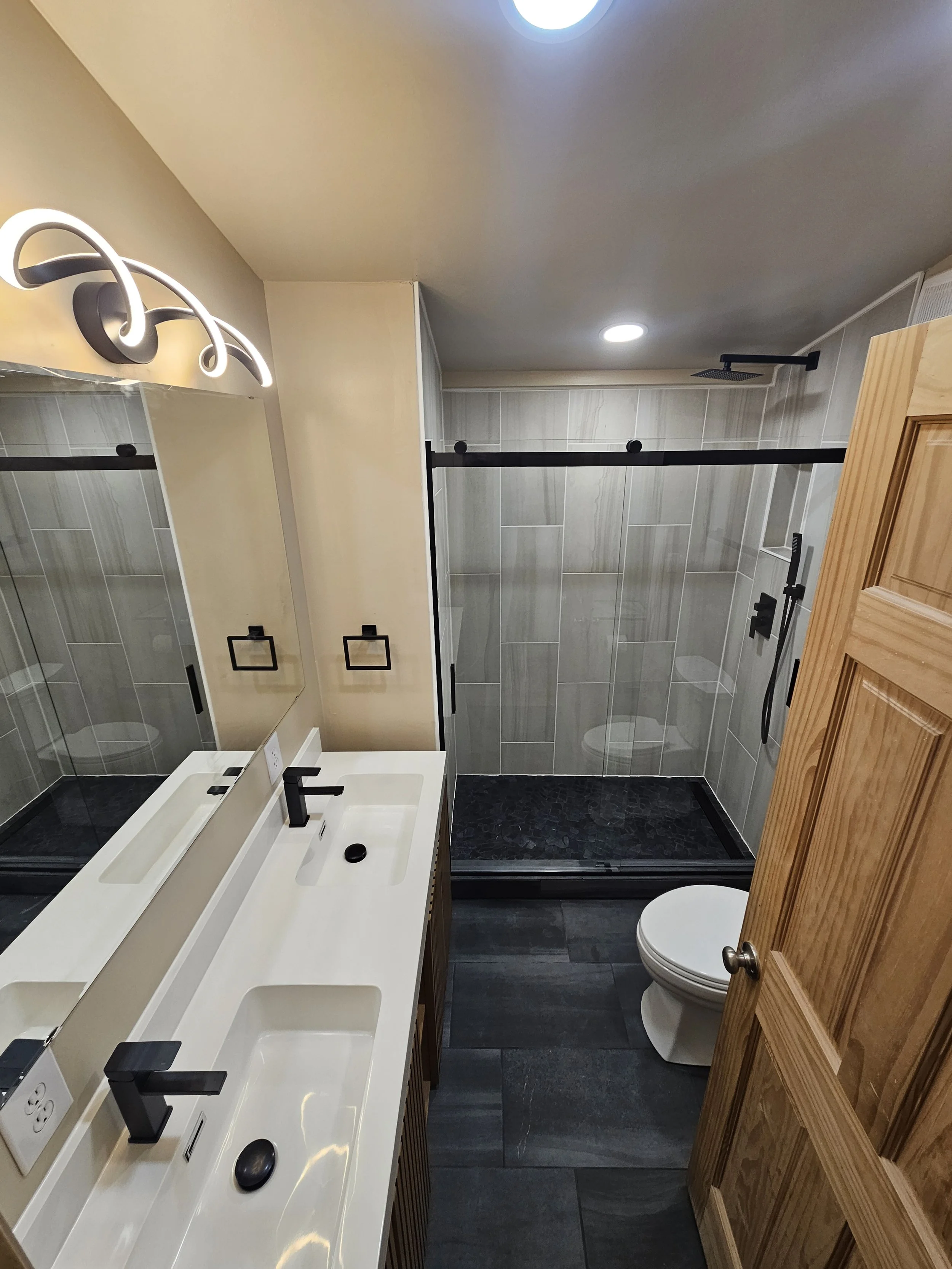 Bathroom remodel with tiled walk-in shower in Colorado Springs home