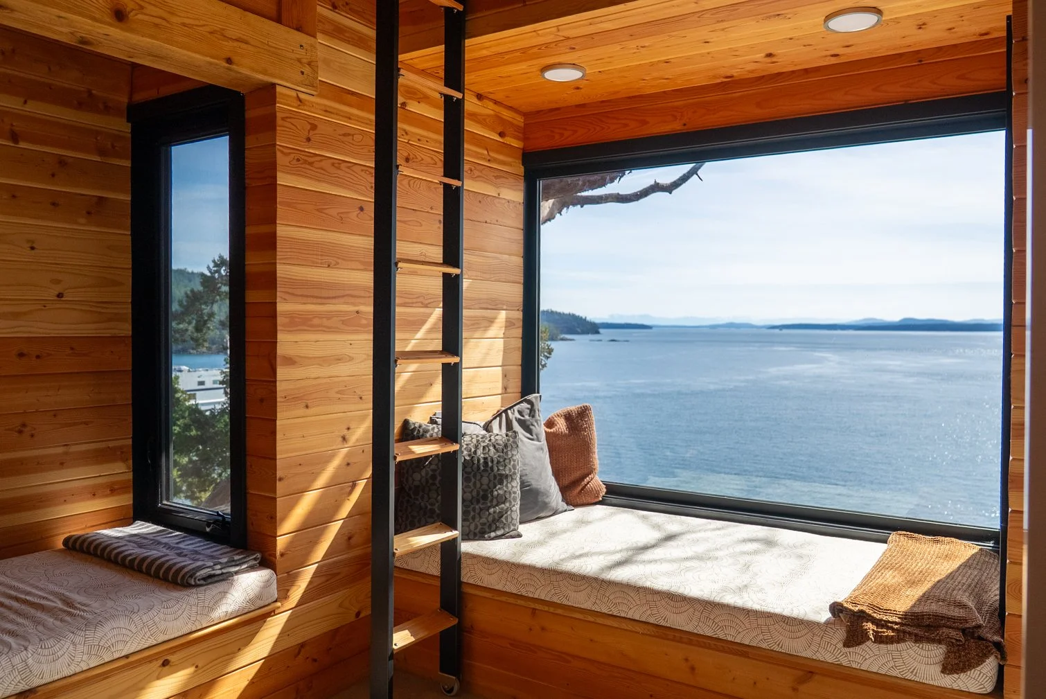 Professional interior real estate photography showcasing the living space of a Pender Island home.