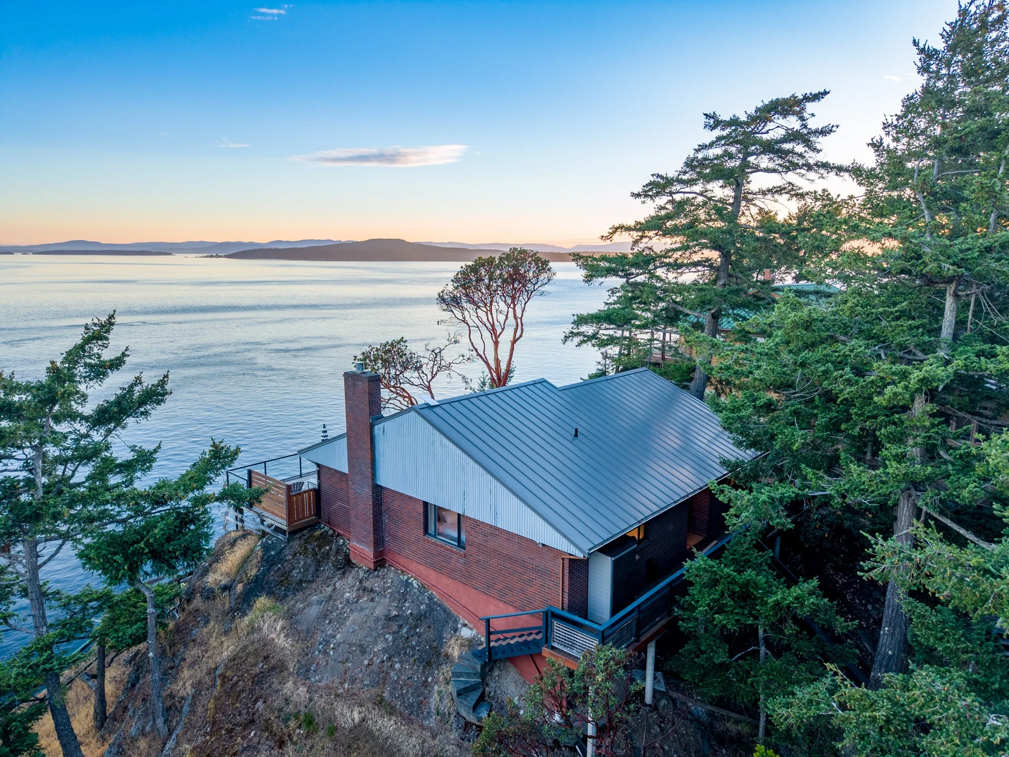 Aerial drone photography showcasing a Pender Island property and its surrounding Southern Gulf Islands landscape.