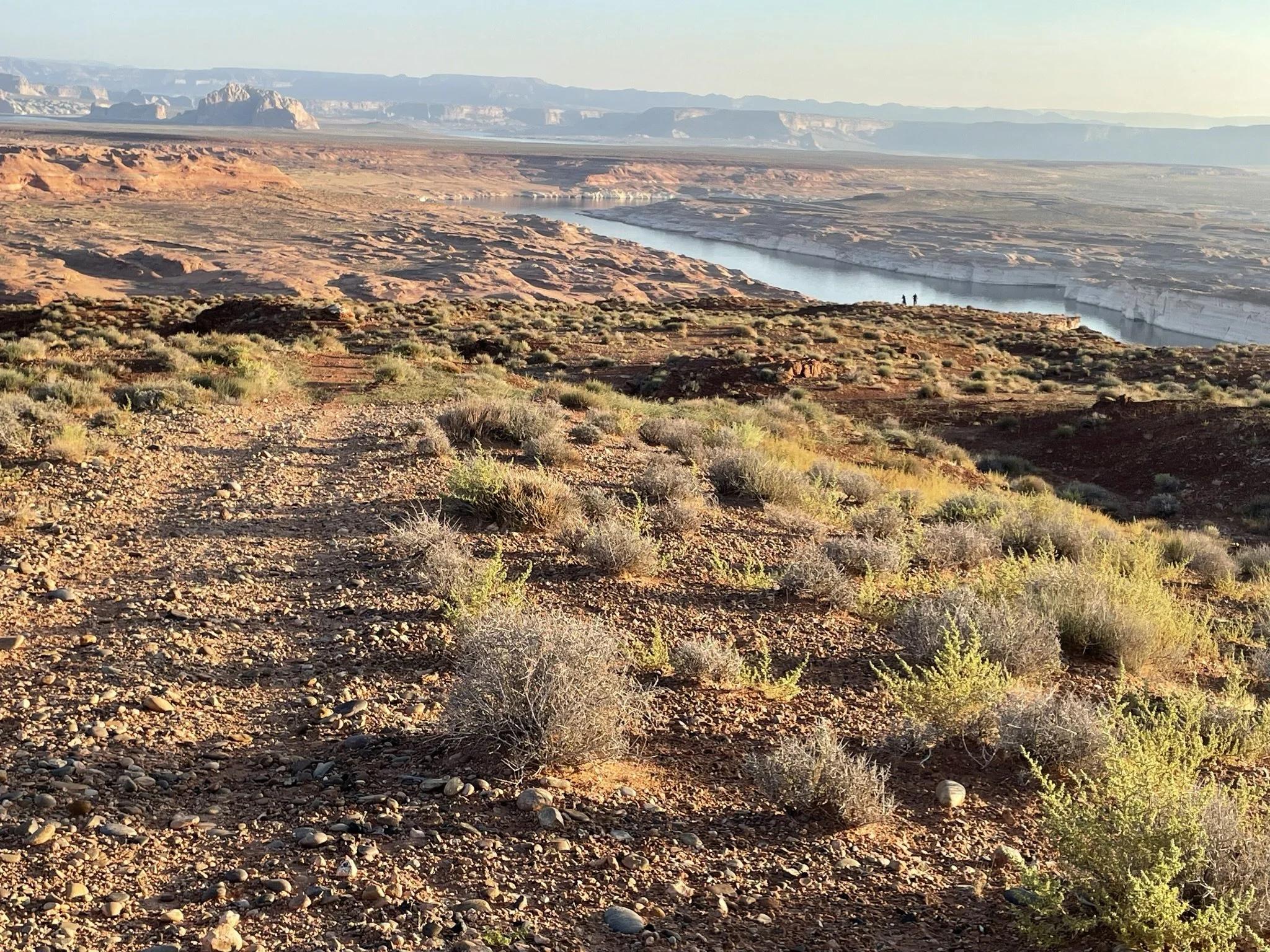 Page Rim Trail tread with Colorado River and distant buttes