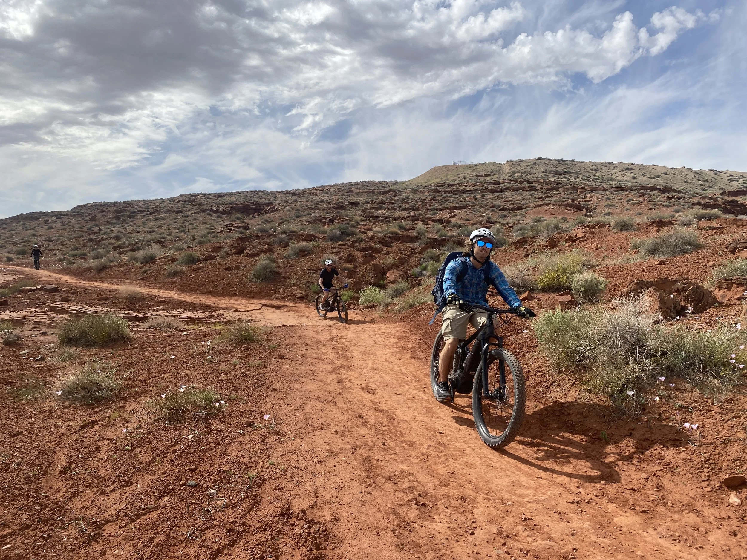 Two mountain bikers riding on Page Rim Trail