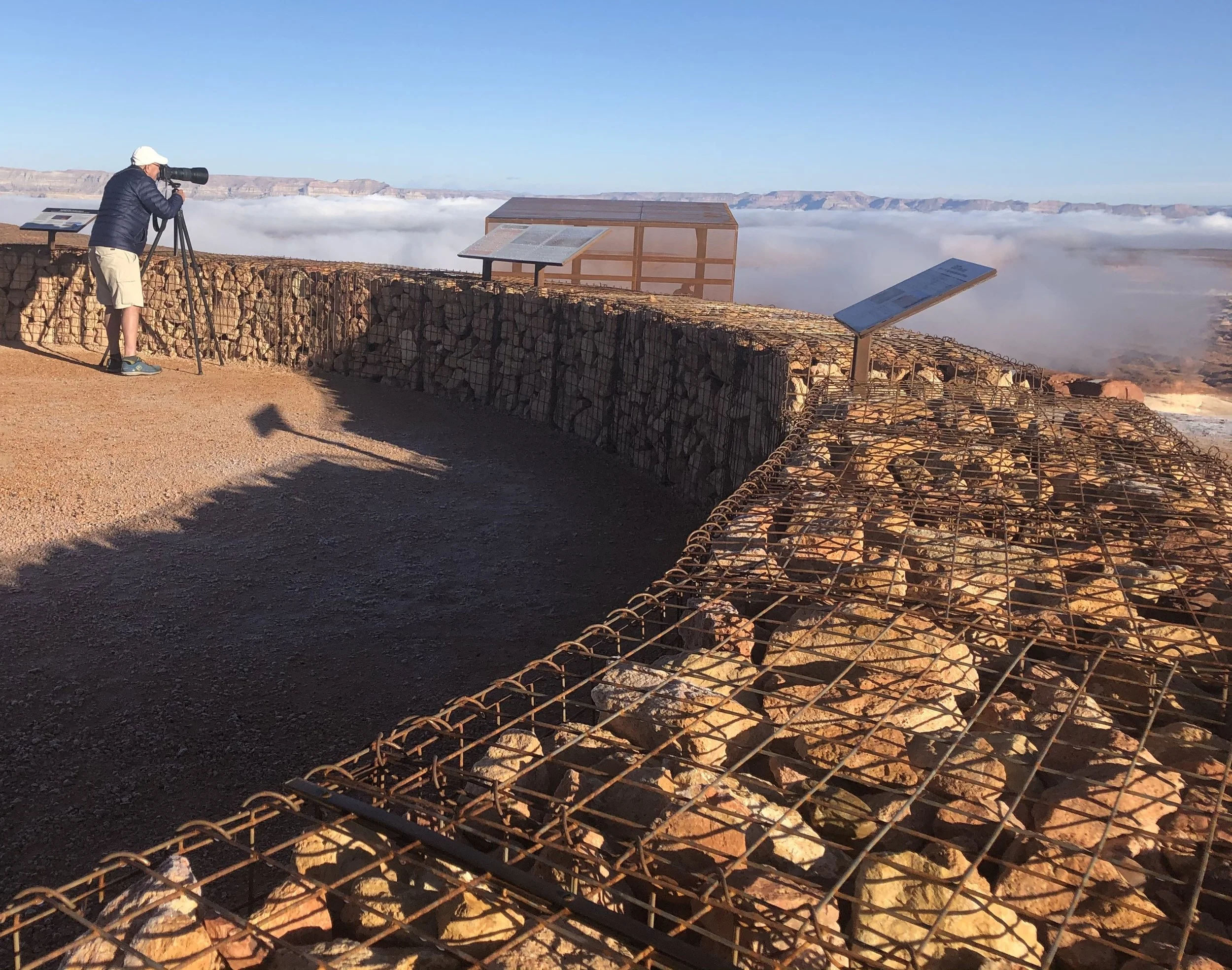 Photographer viewing distant fog at Grandview Knoll Overlook
