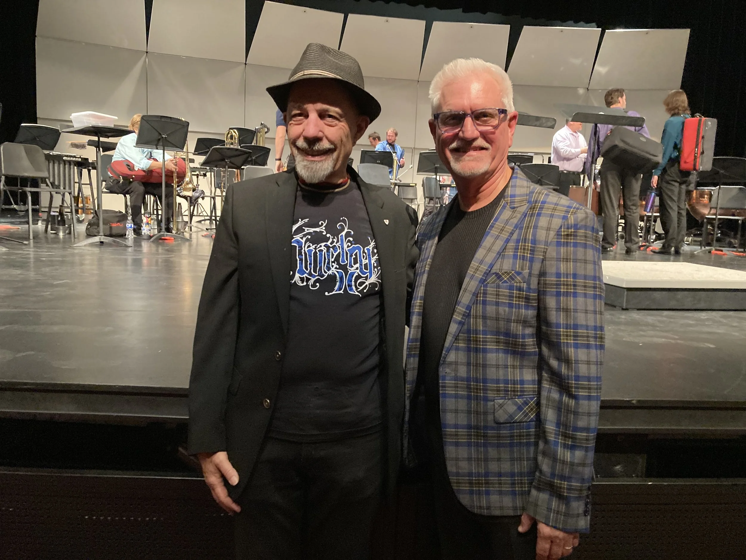 February 15, 2026: Program Chairman Stan Deller with Conductor Kurt Curtis of Southern California Brass Consortium. Photo by Anita Roark.