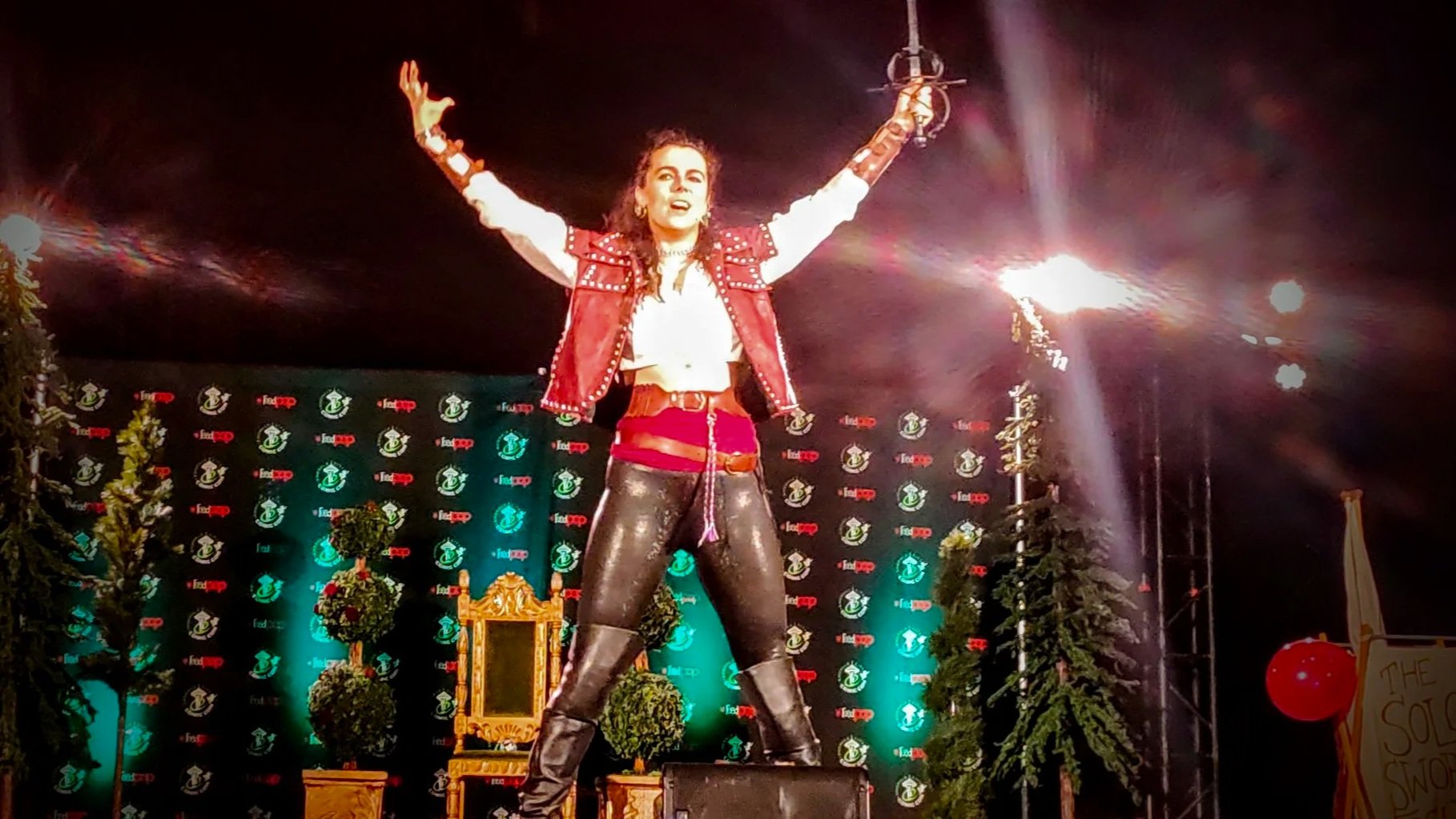 Mornyng Knight on stage in a victory pose-ECCC