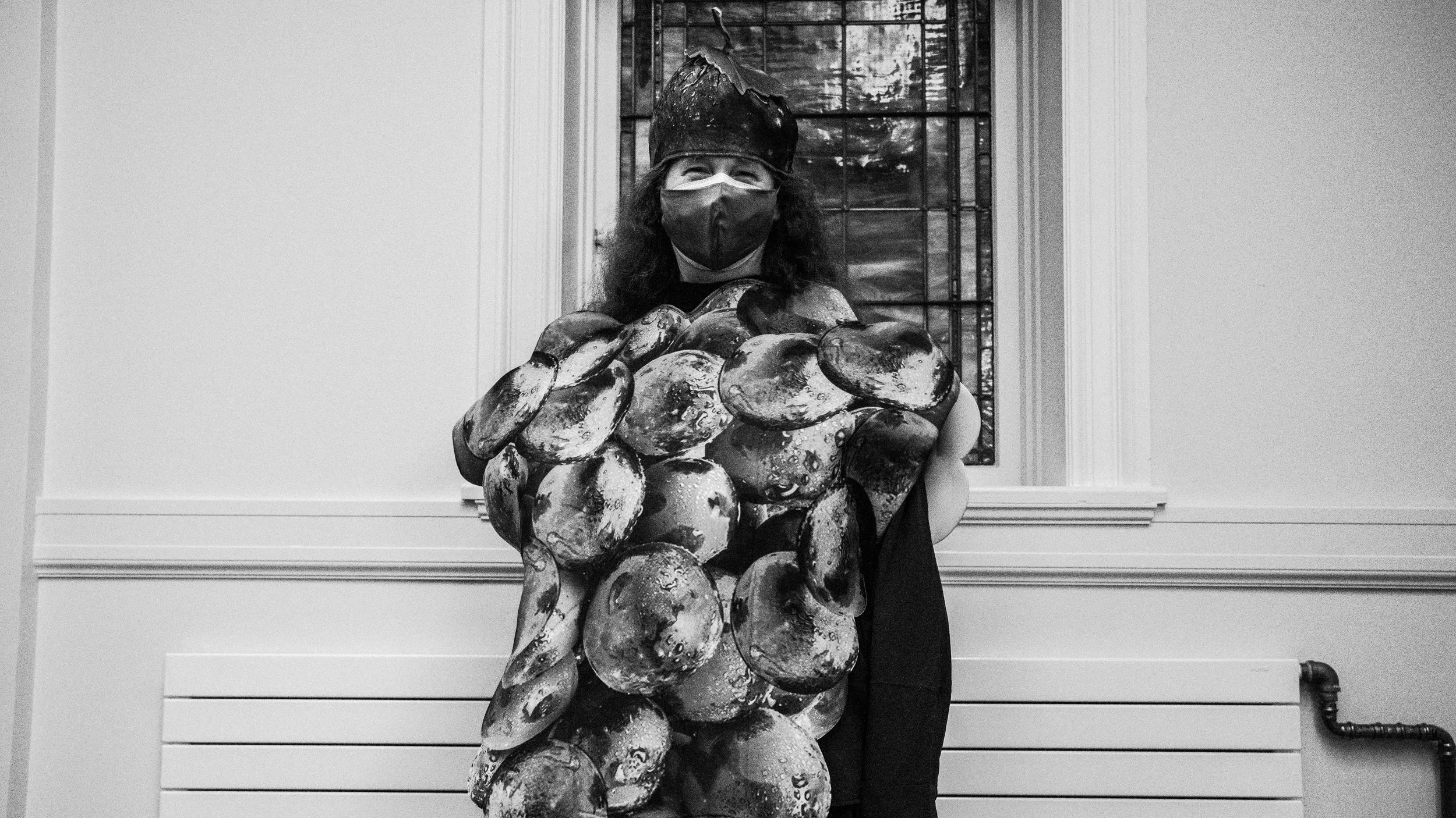 person dressed as a bunch of grapes
