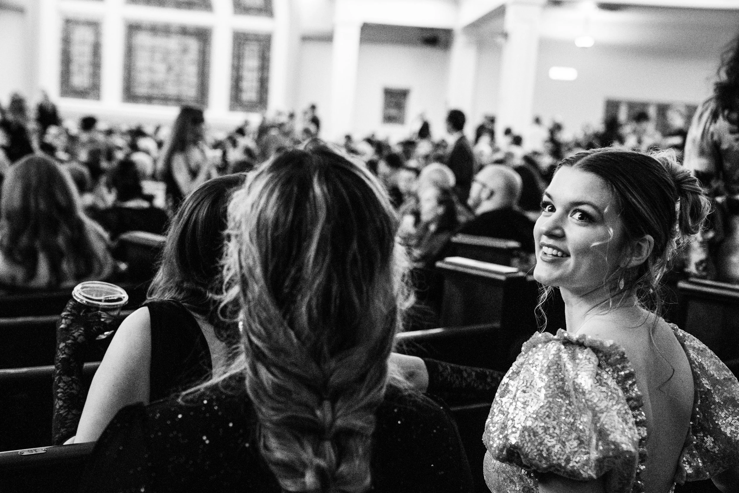 people seated and smiling in the Great Hall