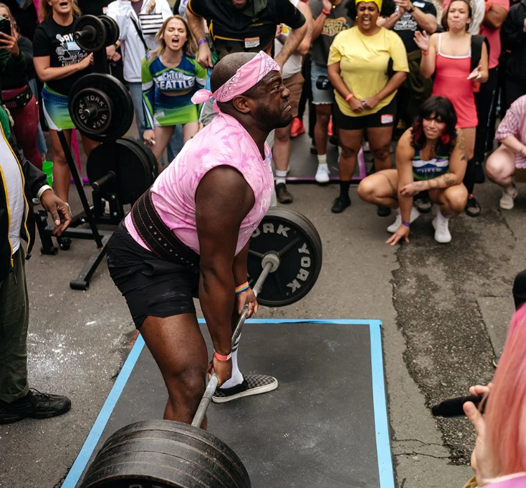 person lifting heavy weights