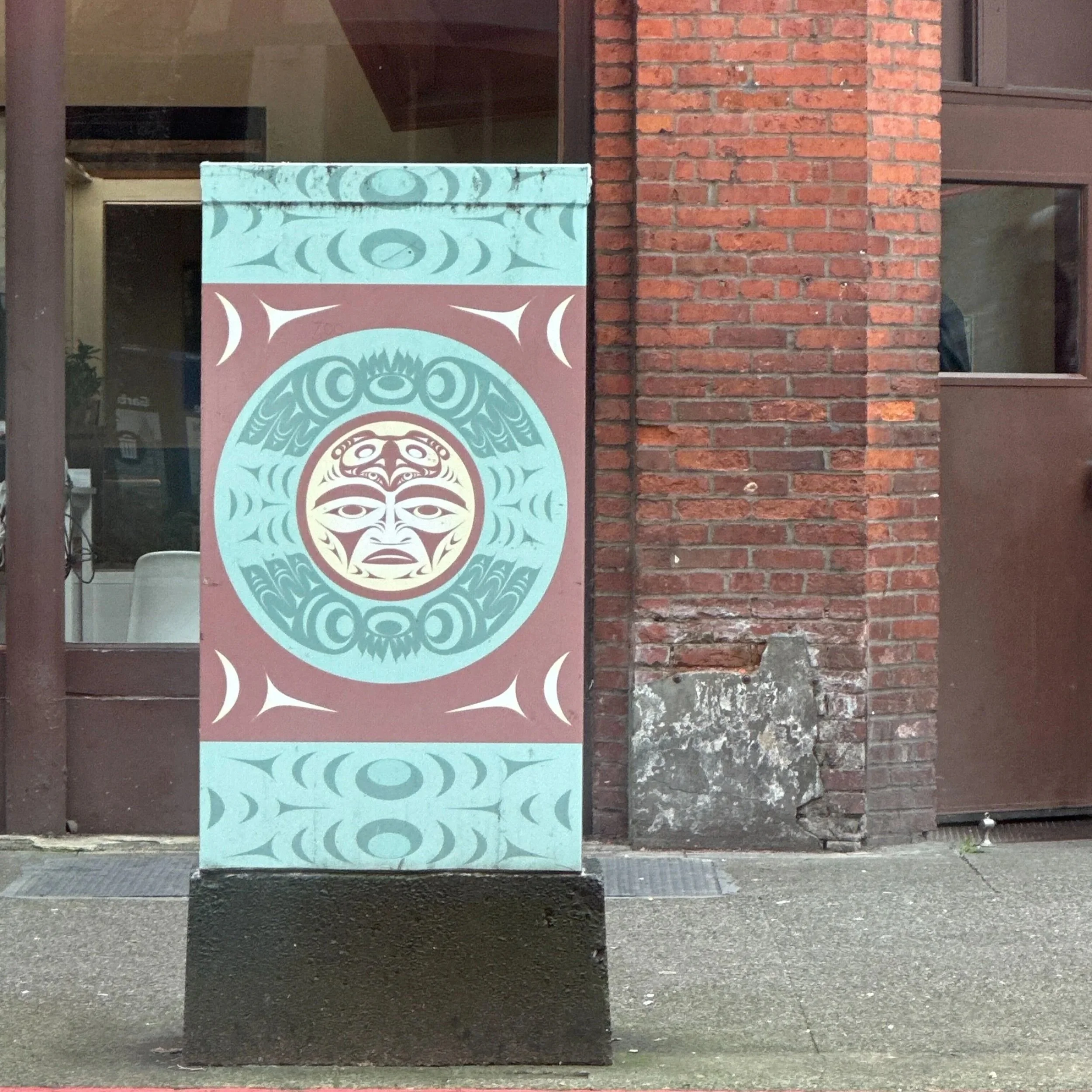 painted utility box with Indigenous art