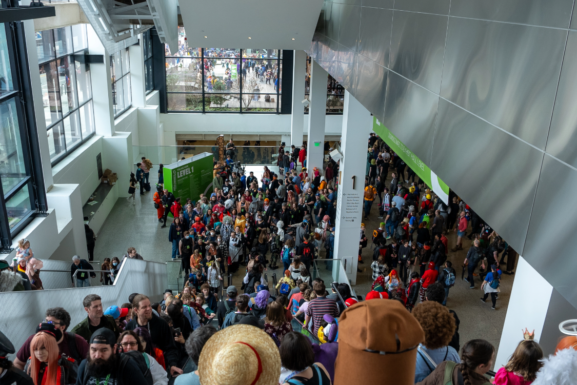 crowd at escalators in Summit Building, ECCC 2024