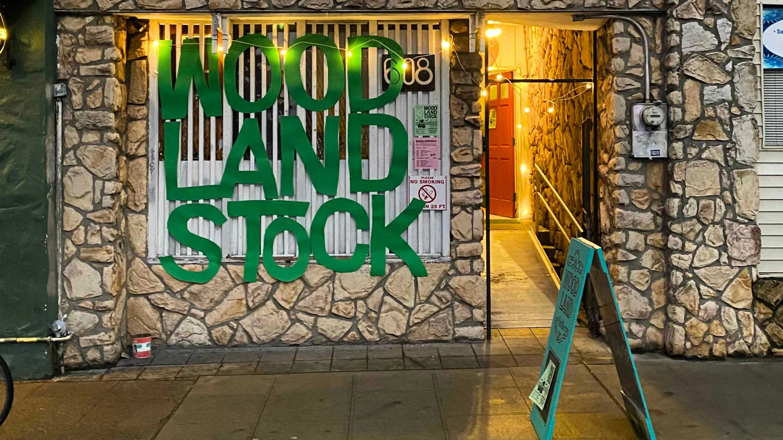 stone facade of Woodland Theater