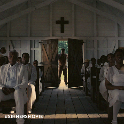 Sammie throws open the doors of his father's church toward the end of Sinners