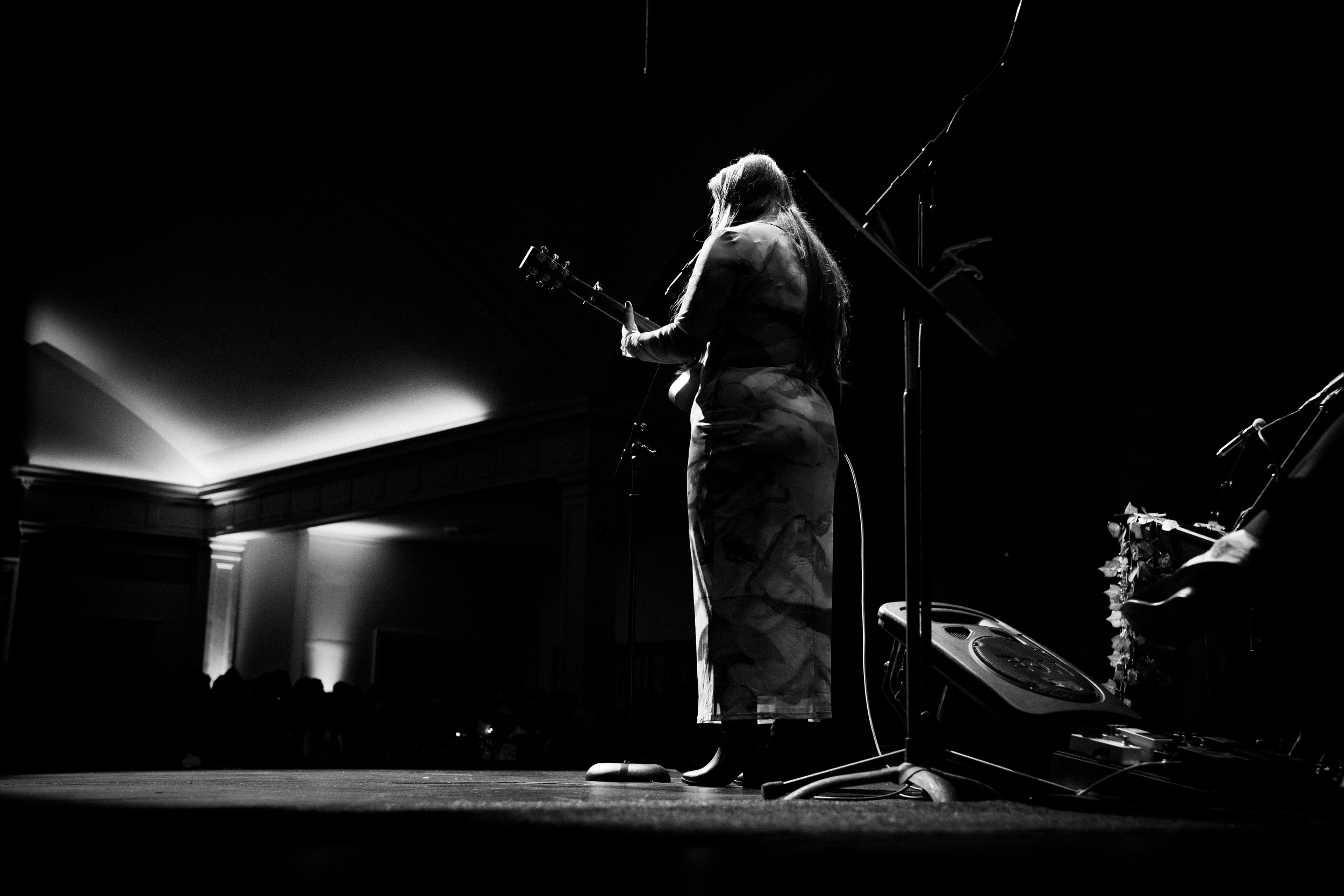 woman guitarist on stage