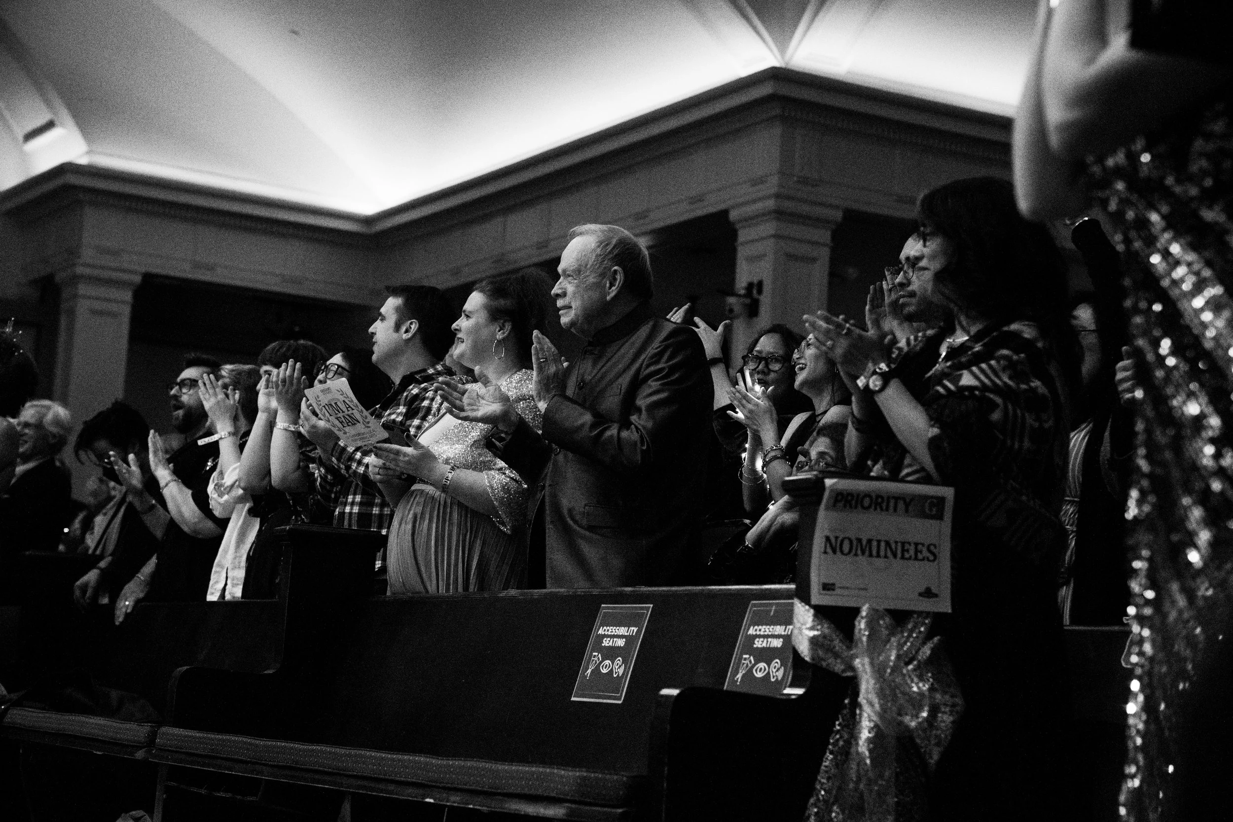 people stand and applaud