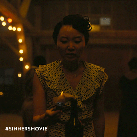 Grace lighting a molotov