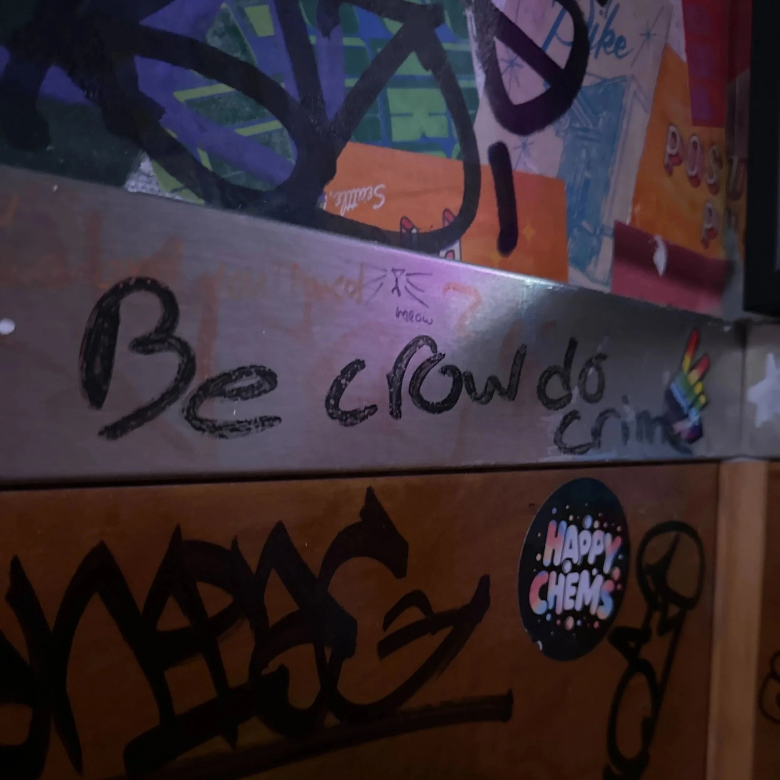 bathroom wall writing and stickers