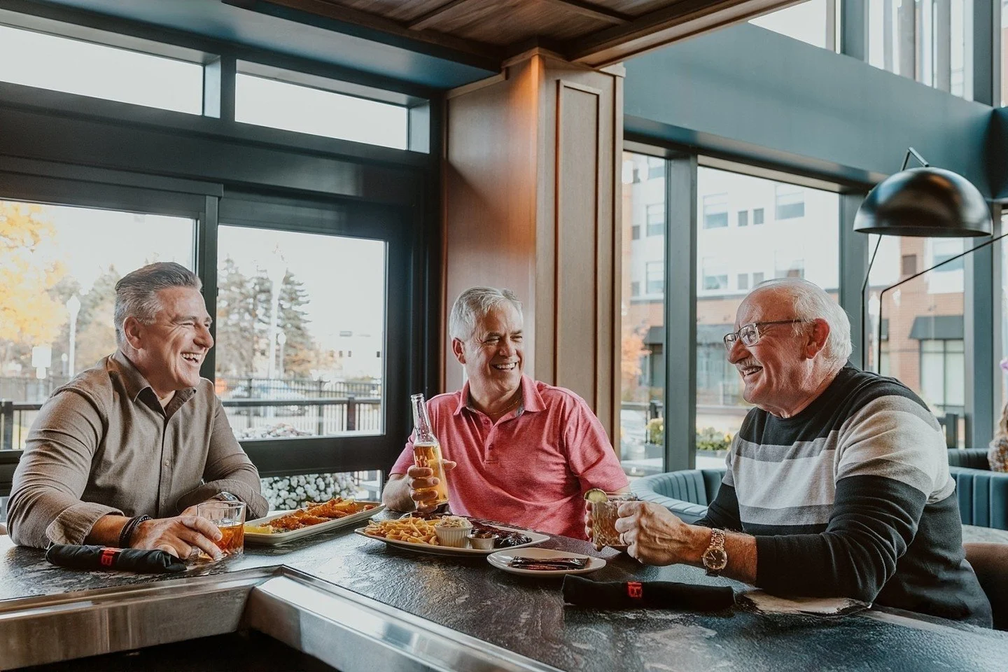 B&acirc;ton Rouge &ndash; Gentlemen Watching the Game

The problem:
Restaurant photos that focused only on the space, not the experience.

The solution:
Capturing real guests enjoying drinks, food, and the game together.

The result:
A space that fee