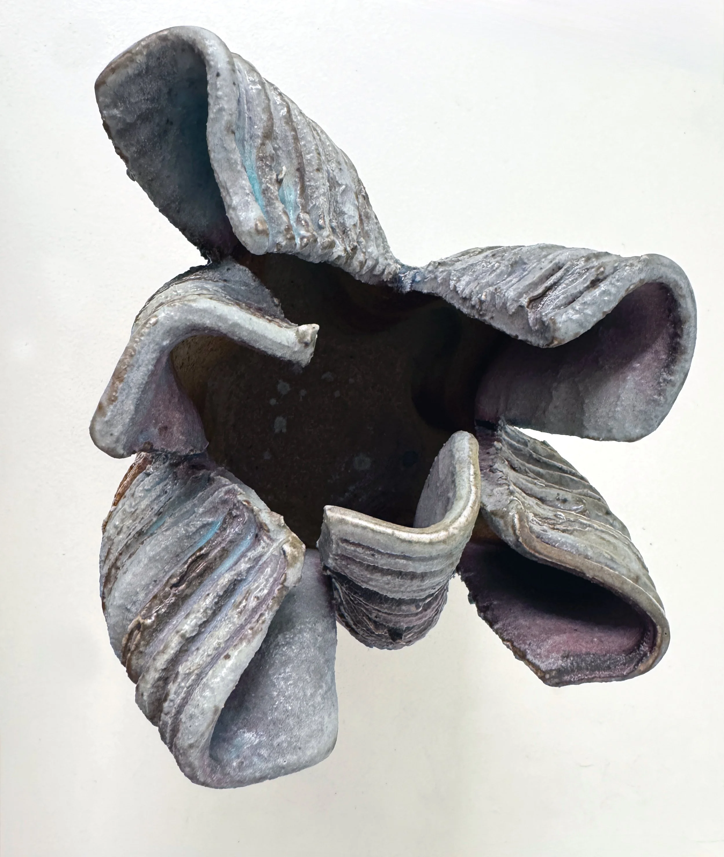 Collapsed Form (Textured WF), 2025. Wood-fired stoneware. 6 1/4" tall x 7" wide