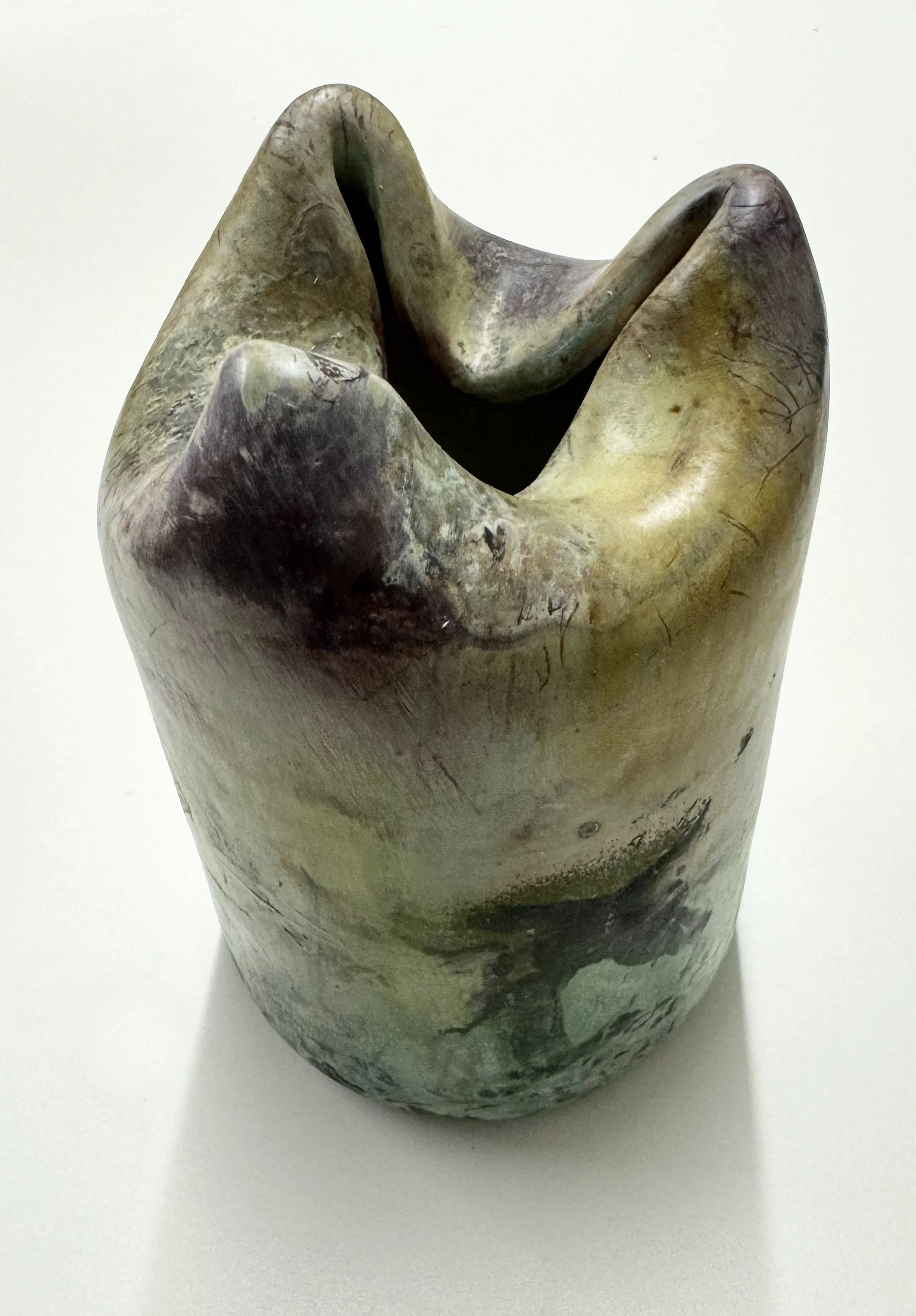 Collapsed Form #1, 2025. Sagar-fired stoneware. 3 7/8" dia x 6" tall.