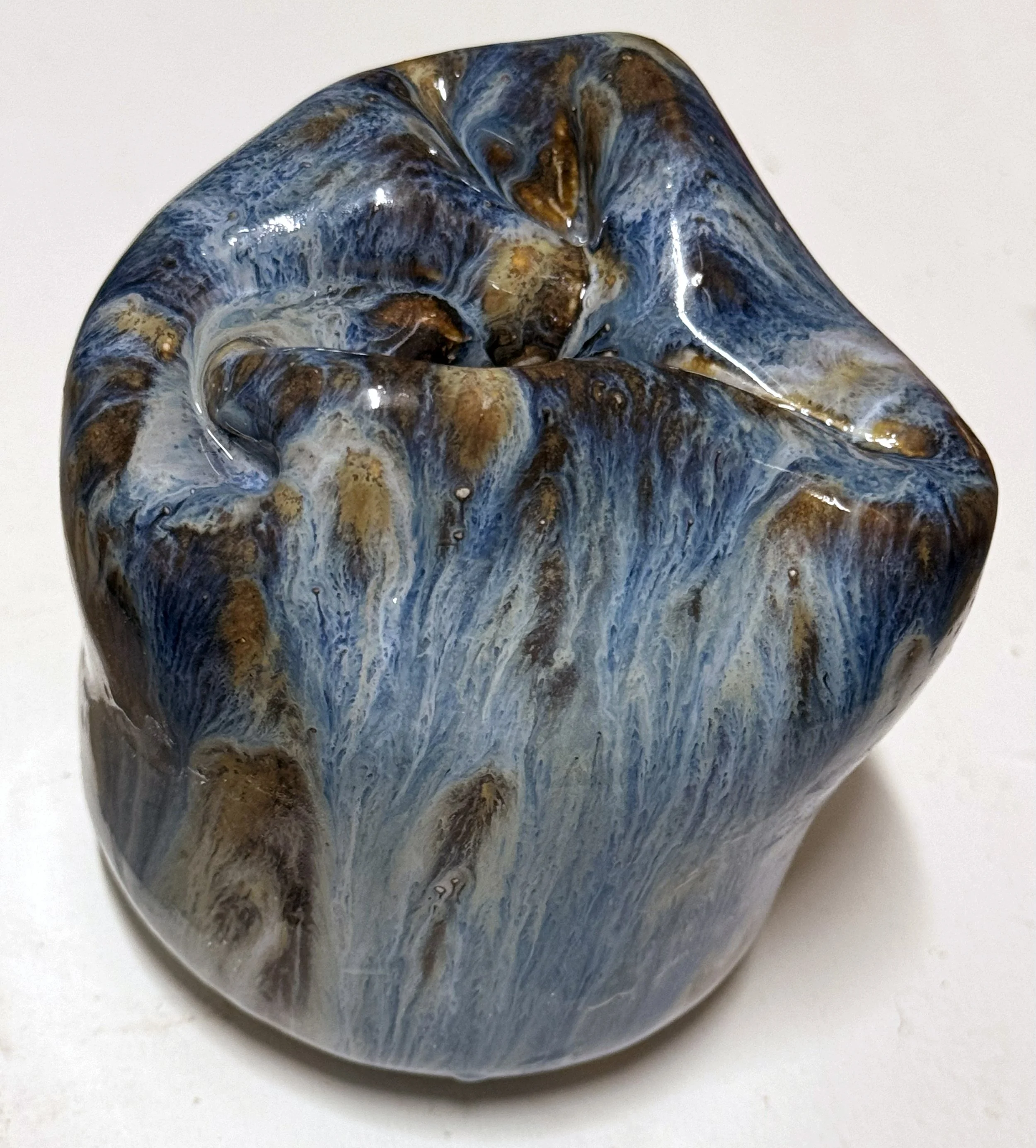 Collapsed Form (Blue), 2024. Stoneware. 4 x 4"