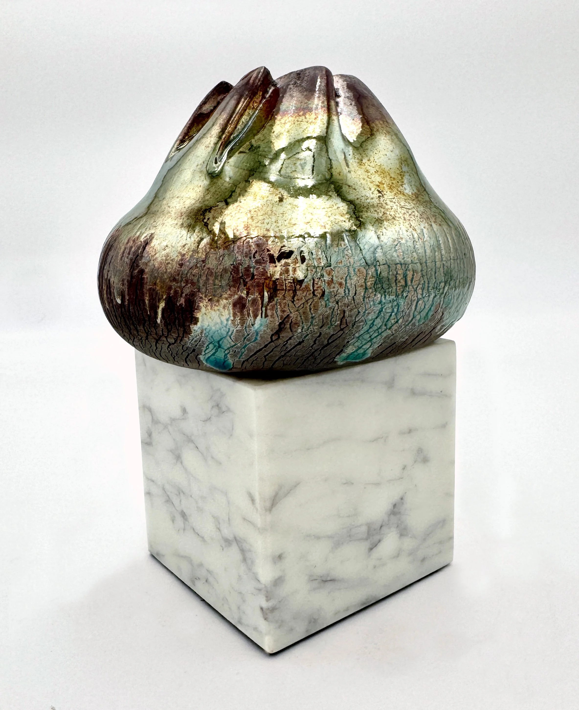 Collapsed (F WF), 2025. Stoneware and marble. 5 1/2 x 7 1/2 x 5 1/2"