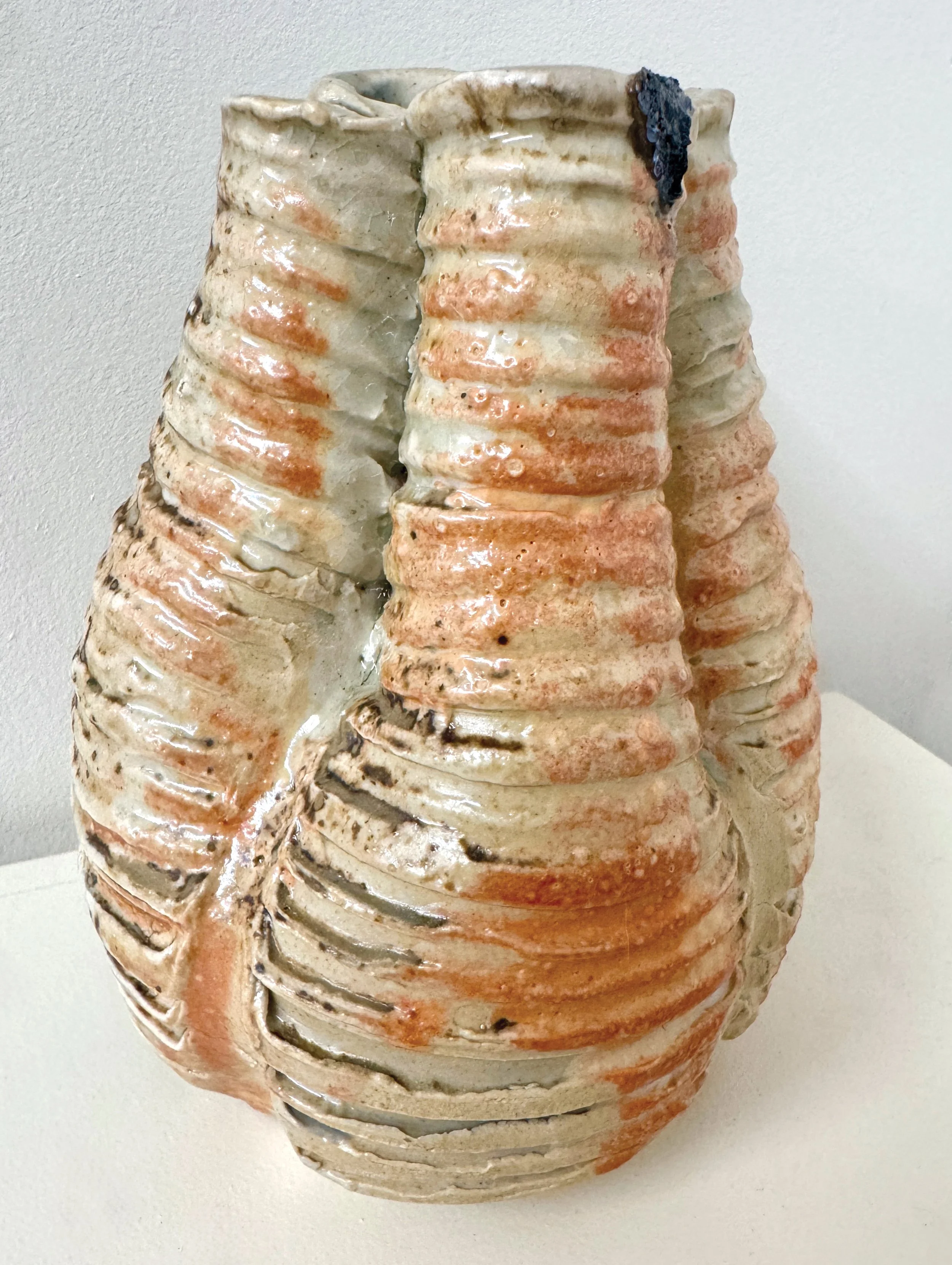 Collapsed Form (Textured WF), 2025. Wood-fired stoneware. 7 x 5 1/4" dia.