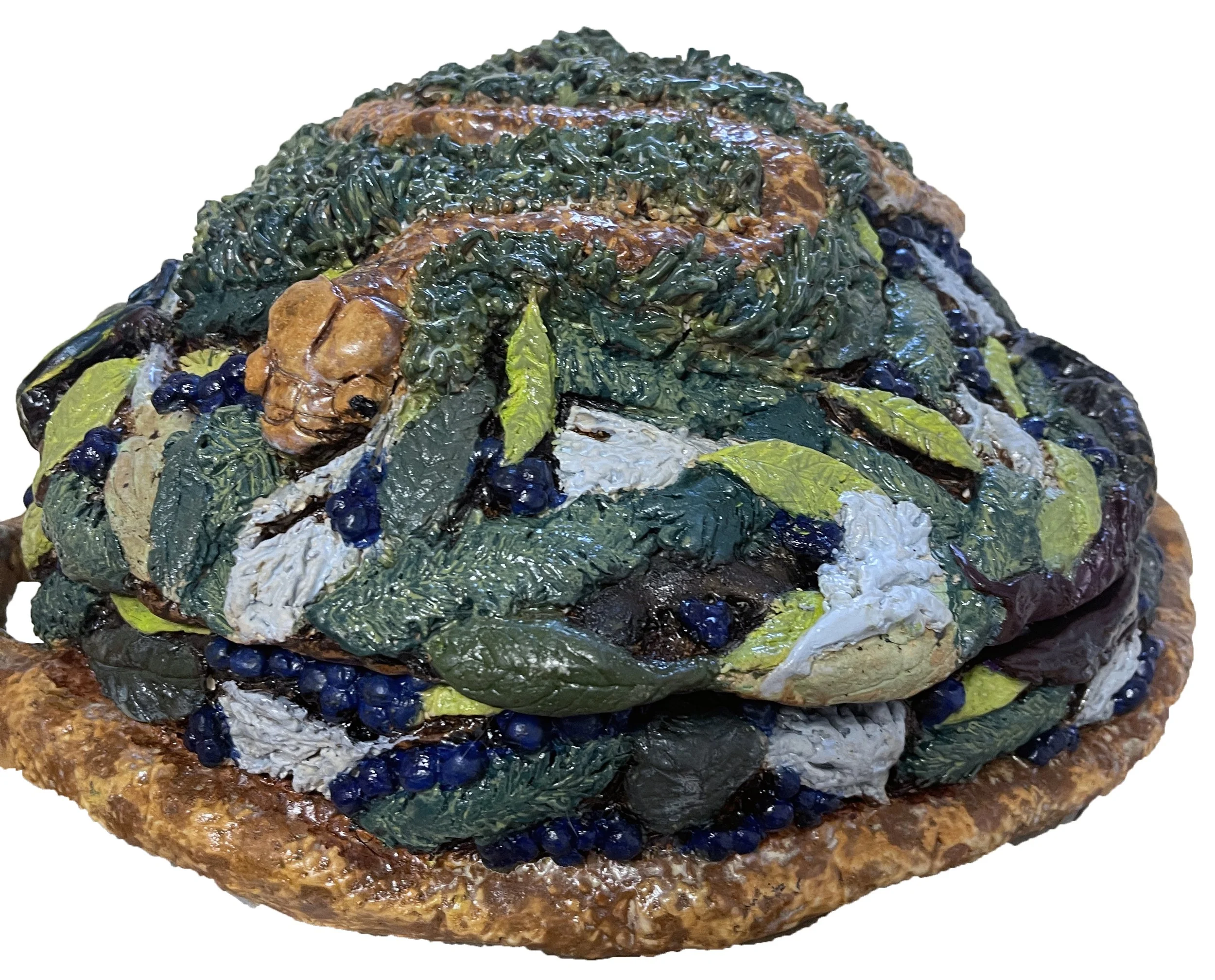 Guam Invaders (from the side, closed), 2024. 13 1/4" wide x 6 1/2" tall. Stoneware,