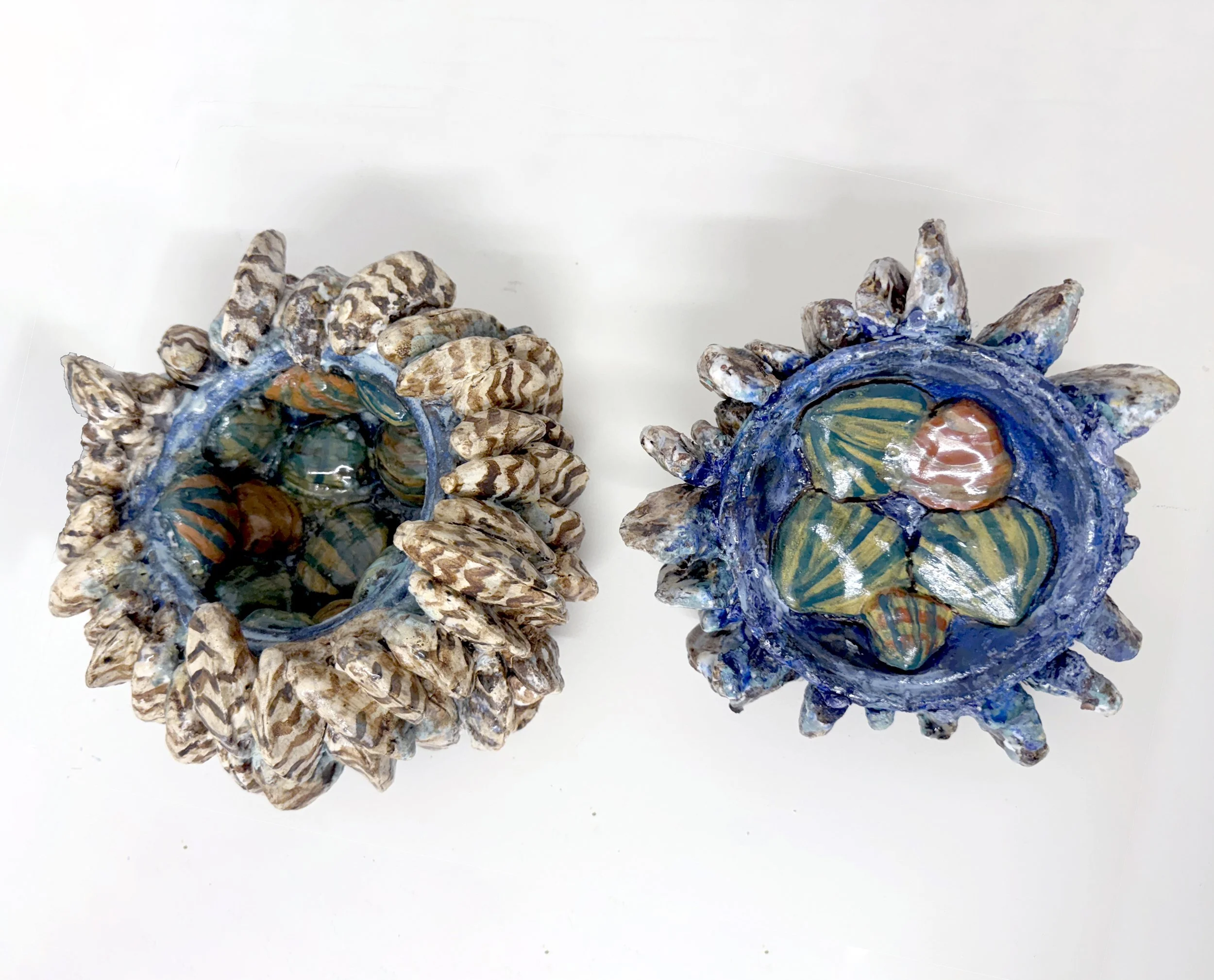 Zebra Mussels, 2025. Stoneware. 2-part piece: the bottom pot is 9" wide x 4 3/4" tall; the lid is 4 1/2" tall x 7 1/2" wide (inside of lid shown)
