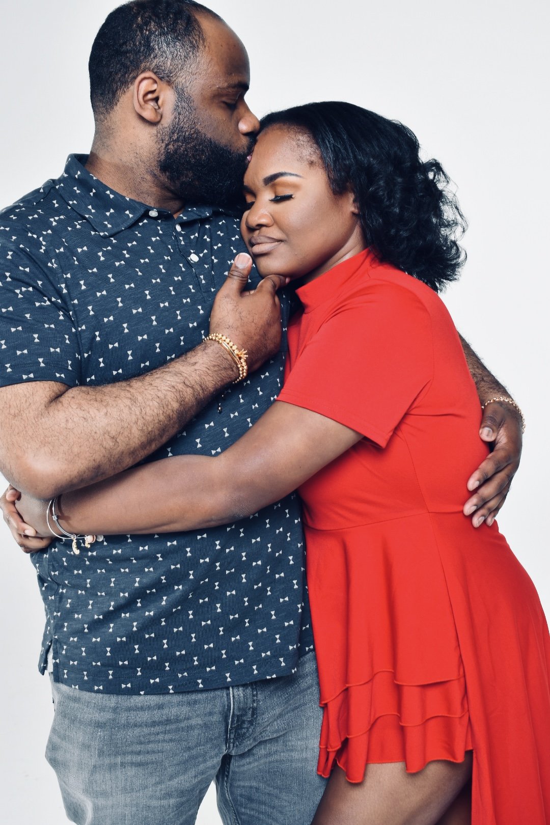 Laurie’s customers, Fernando and Kate embracing by the lake on their wedding day.
