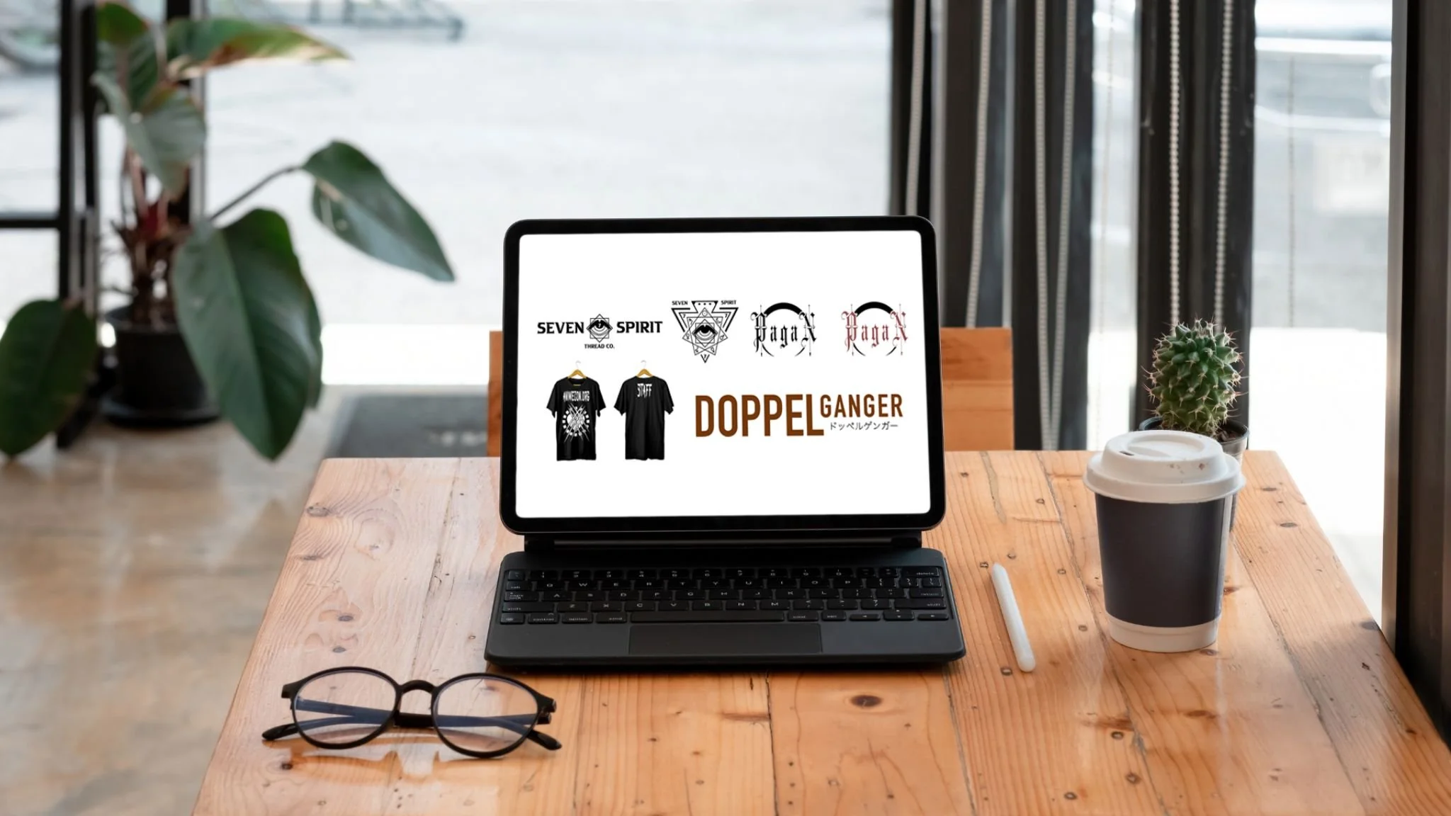 Branding and logo design mockup displayed on laptop showcasing work by Rieley Finn of Seven Spirit Media
